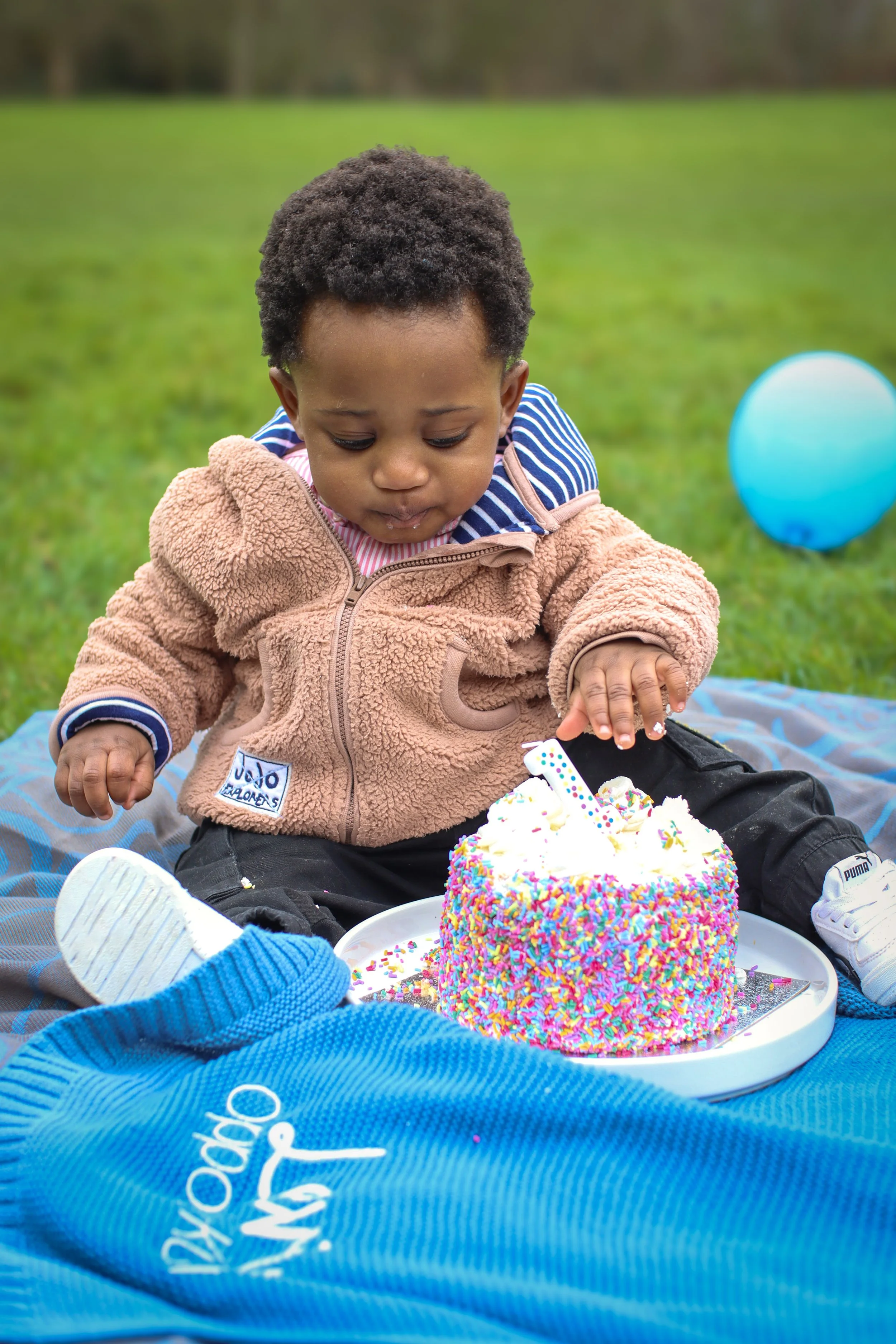 Family photos and portraits taken by a family photographer in Milton Keynes, Buckinghamshire in the UK. Special occasions, christening, baptism, newborn, baby, birthday, anniversary, wedding photo shoots and sessions