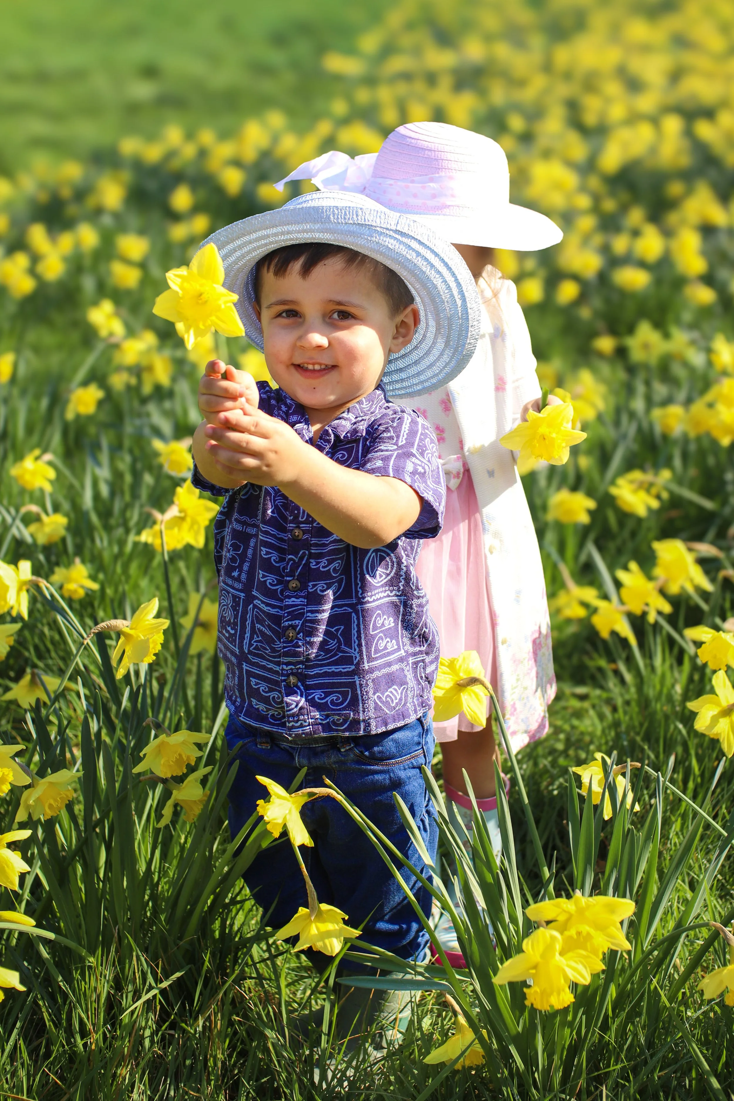 Family photos and portraits taken by a family photographer in Milton Keynes, Buckinghamshire in the UK. Special occasions, christening, baptism, newborn, baby, birthday, anniversary, wedding photo shoots and sessions