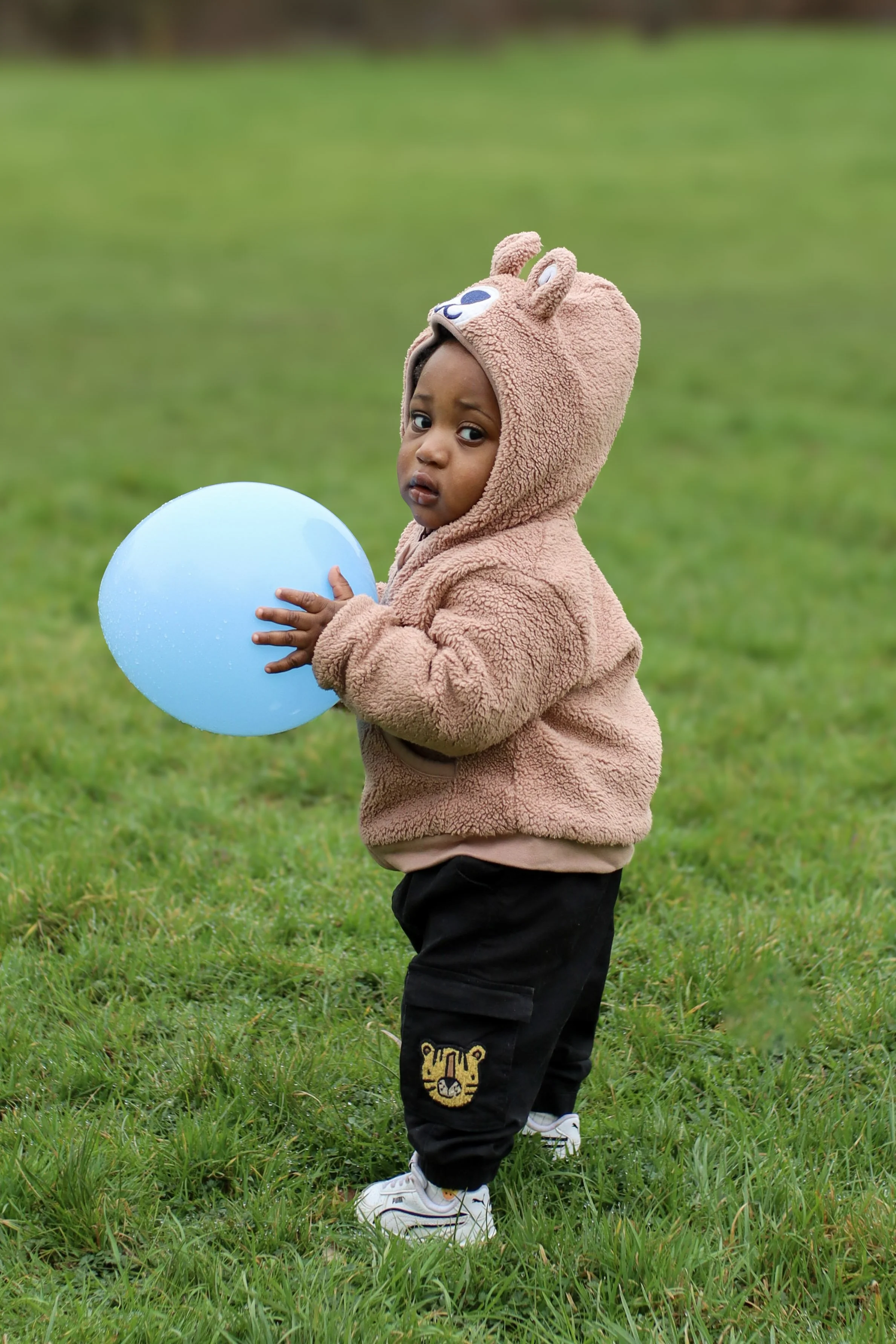 Family photos and portraits taken by a family photographer in Milton Keynes, Buckinghamshire in the UK. Special occasions, christening, baptism, newborn, baby, birthday, anniversary, wedding photo shoots and sessions