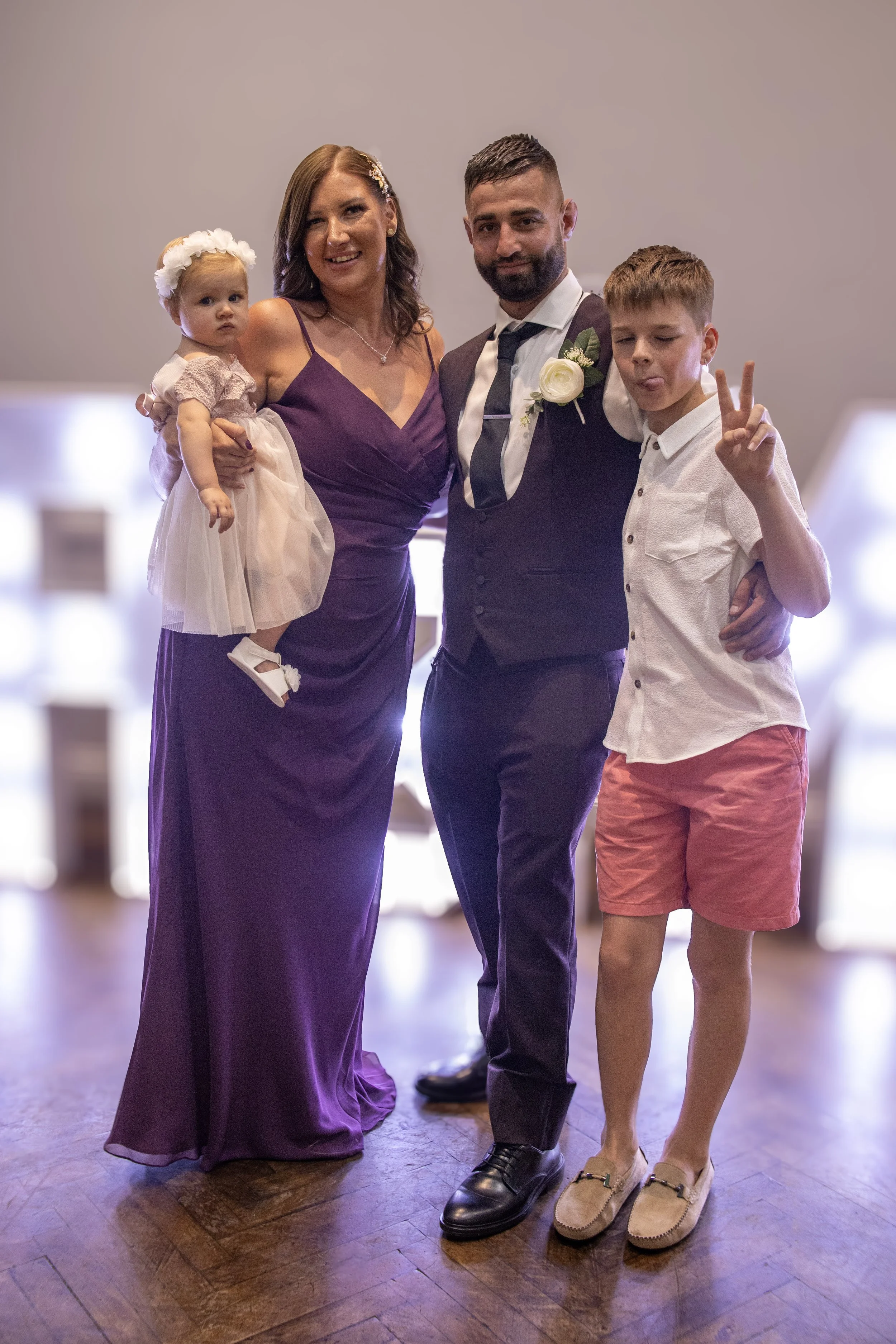Family photos and portraits taken by a family photographer in Milton Keynes, Buckinghamshire in the UK. Special occasions, christening, baptism, newborn, baby, birthday, anniversary, wedding photo shoots and sessions, weddings