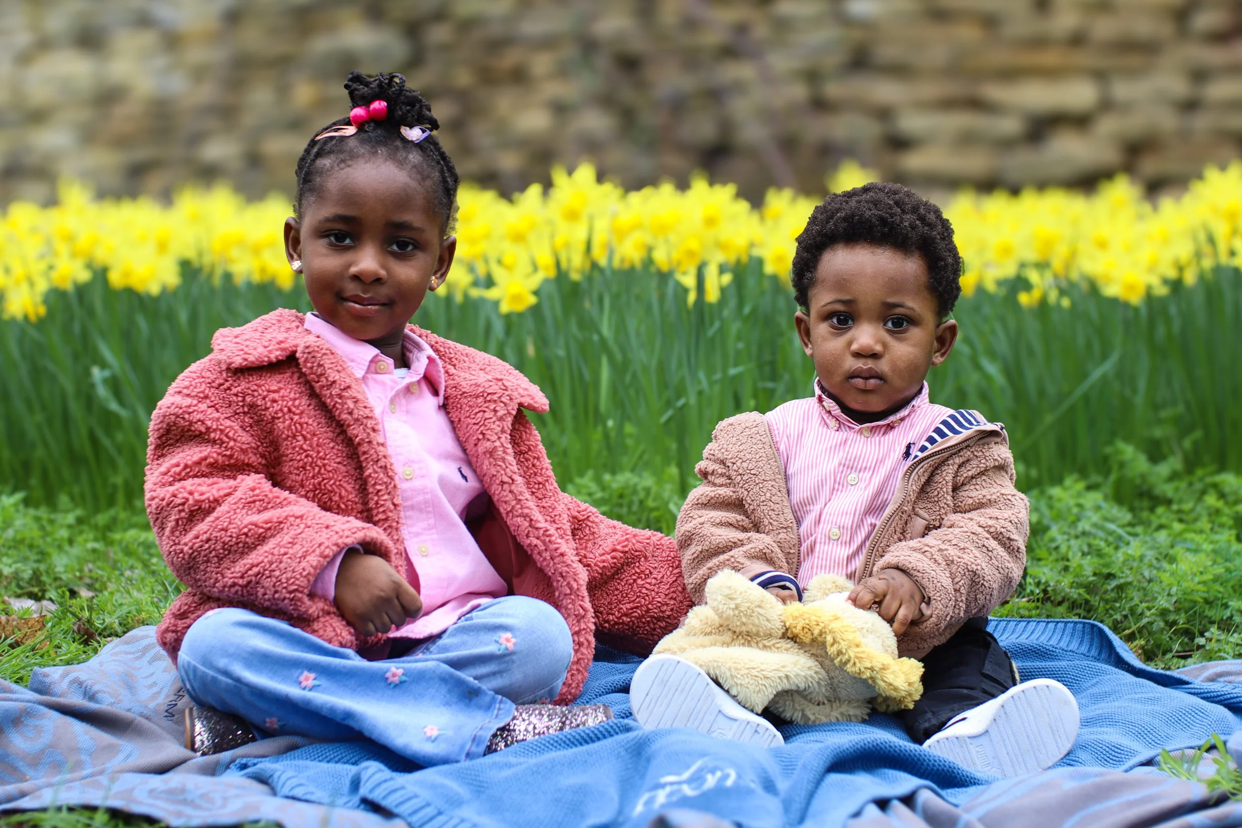Family photos and portraits taken by a family photographer in Milton Keynes, Buckinghamshire in the UK. Special occasions, christening, baptism, newborn, baby, birthday, anniversary, wedding photo shoots and sessions