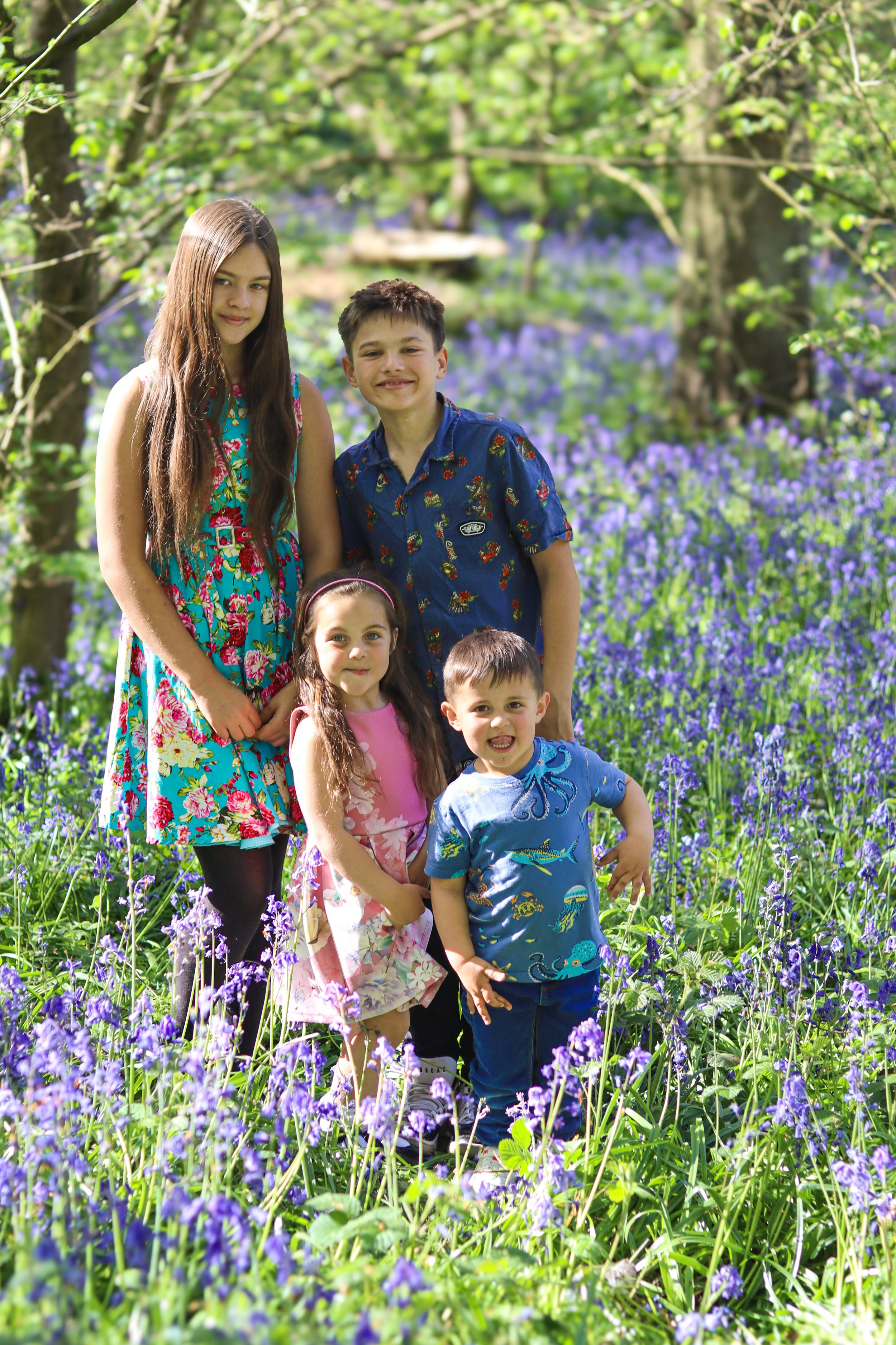 Family photos and portraits taken by a family photographer in Milton Keynes, Buckinghamshire in the UK. Special occasions, christening, baptism, newborn, baby, birthday, anniversary, wedding photo shoots and sessions