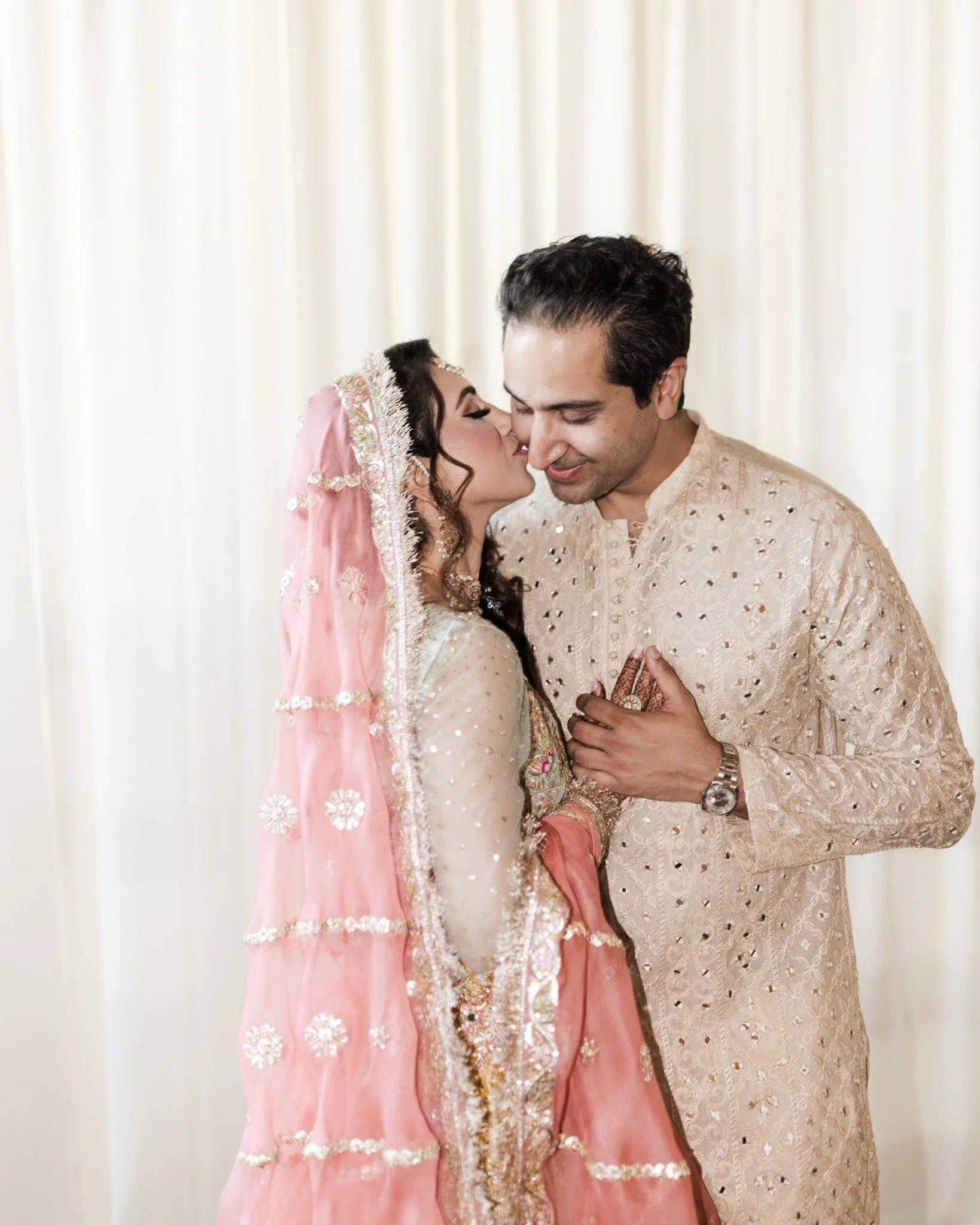 The multi-day celebration began with the Friday night Mehndi, where Kiran and Samir&rsquo;s wedding weekend was welcomed in the warm embrace of tradition. Hands were adorned with intricate henna, elders shared their blessings, music flowed through th