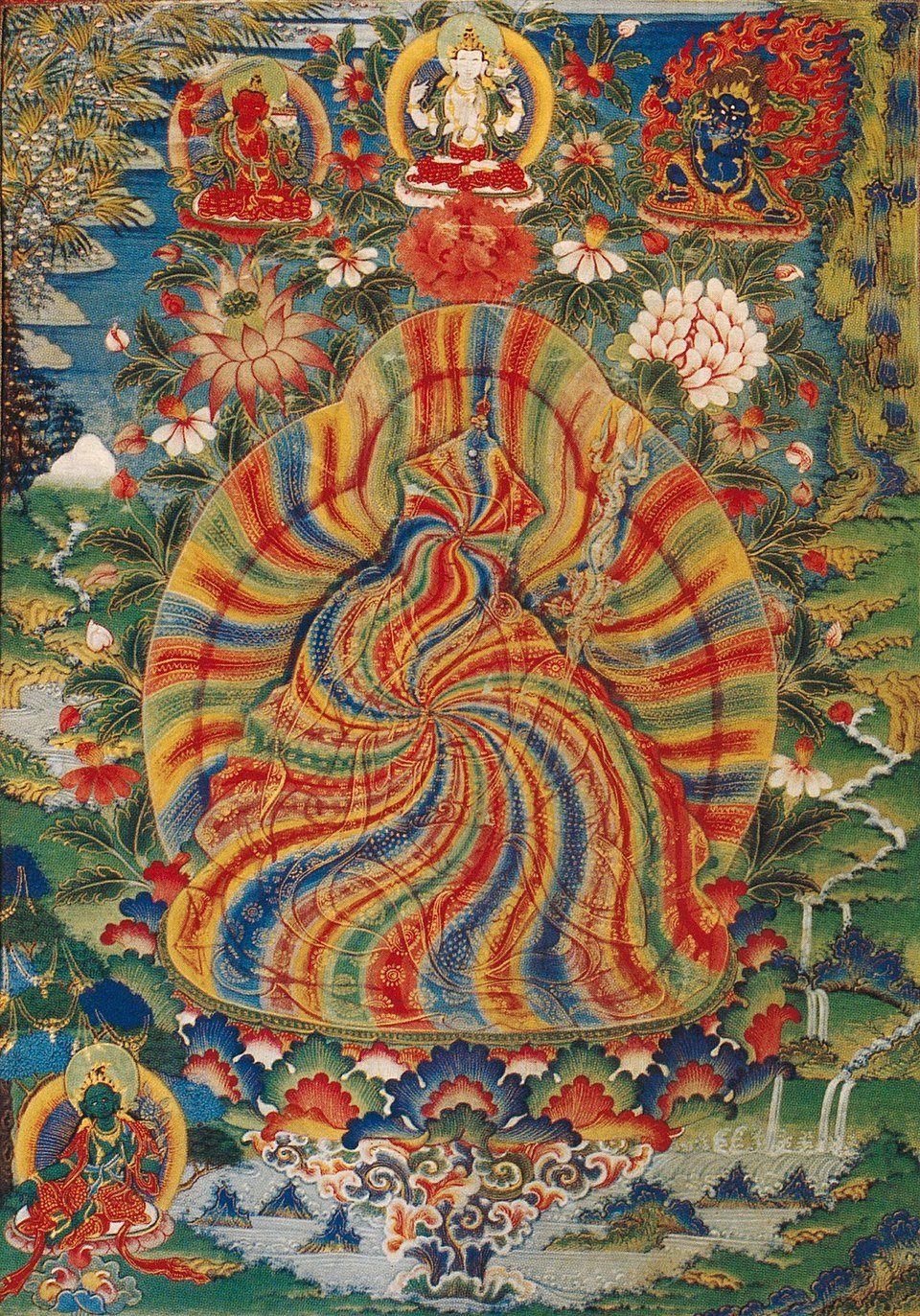 Colorful Tibetan thangka painting featuring multiple deities, intricate patterns, and floral motifs, centered around a rainbow-colored figure.