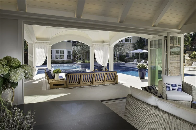 The covered loggia, looking back to the main house