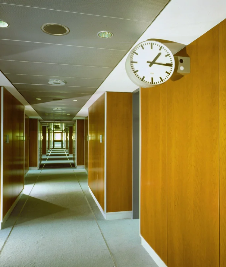 Office corridor with wood-panelled walls