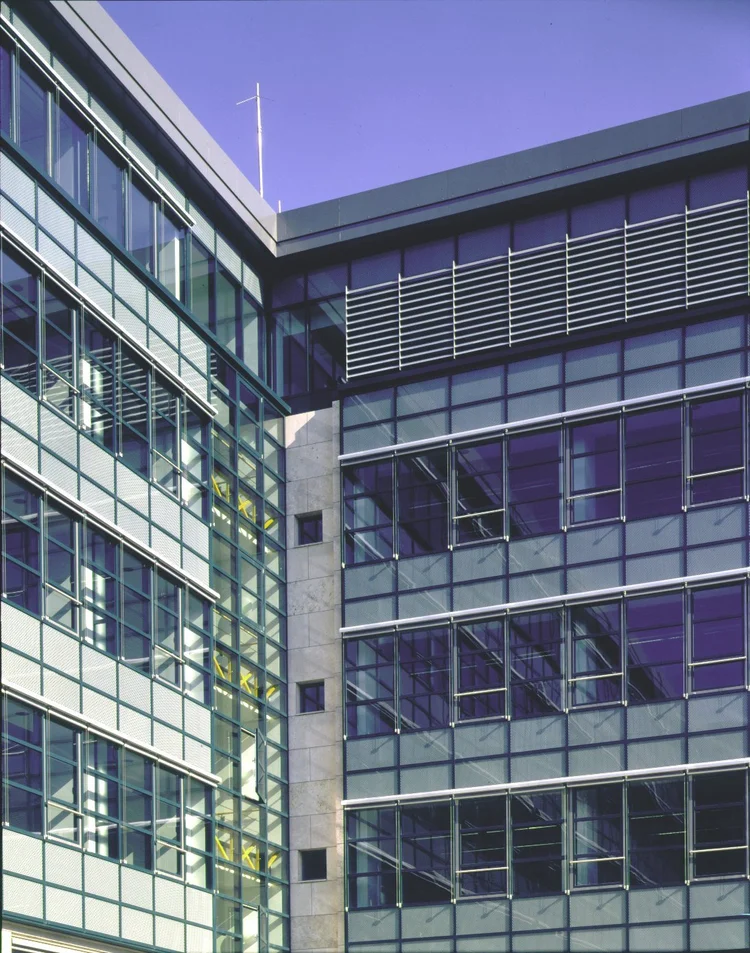 Glass and steel façades facing the courtyard