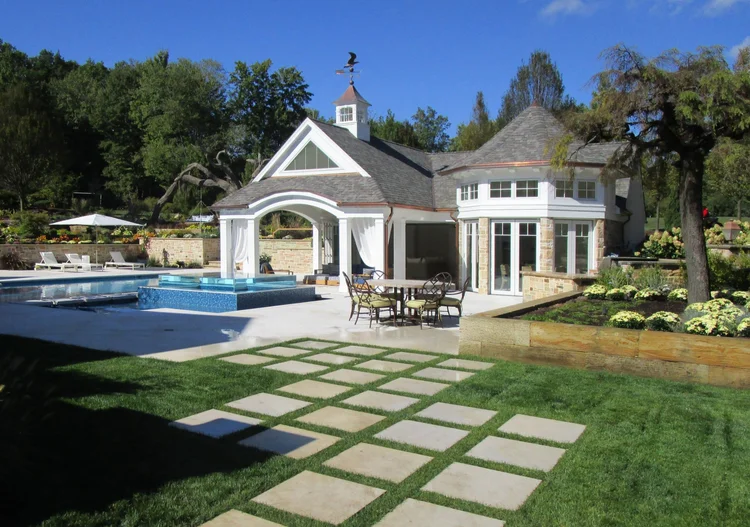 Pool house with cupola, loggia and garden terraces