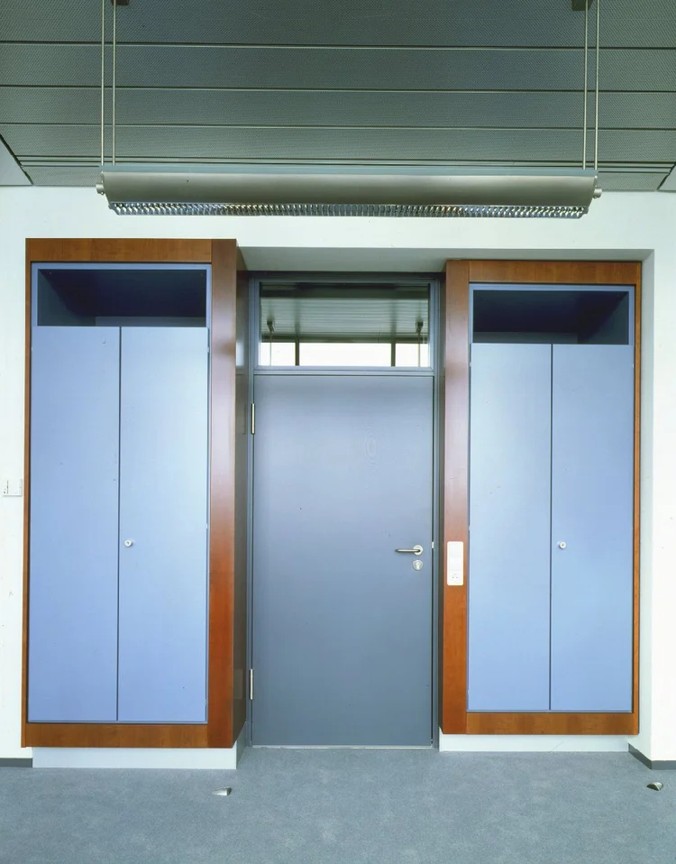 Office entrance with built-in cabinets