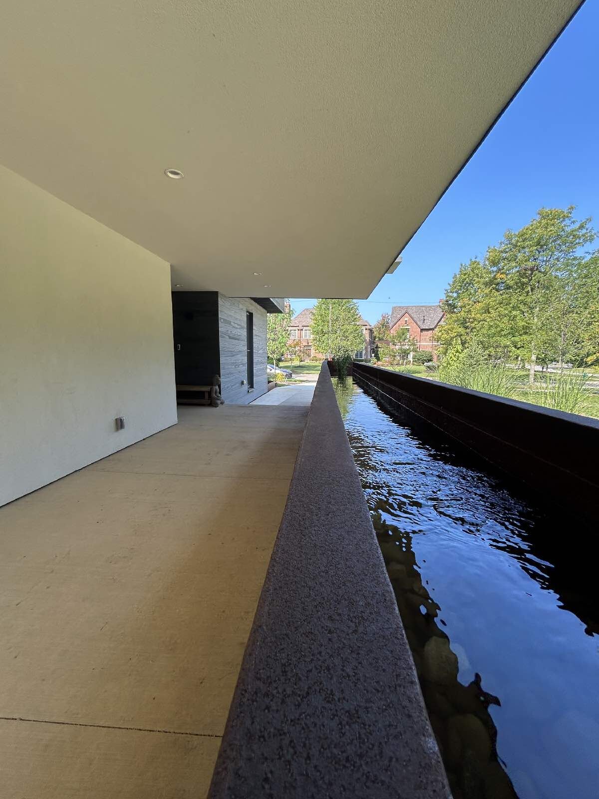 Rainwater channel along the covered walkway