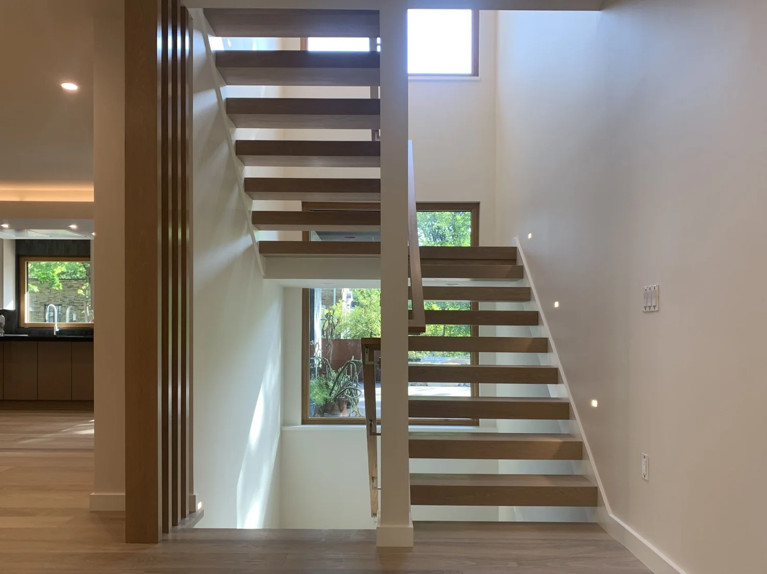 Open-tread stairwell with daylight