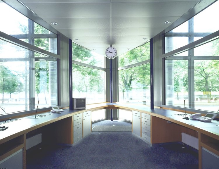 Reception desk in a glass corner
