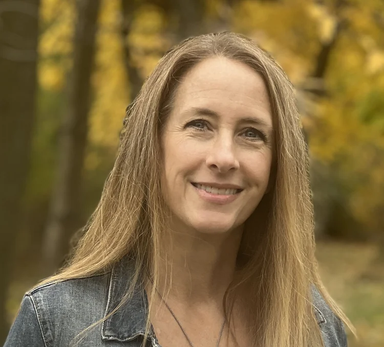 Portrait of Michelle Kolbe outdoors in autumn