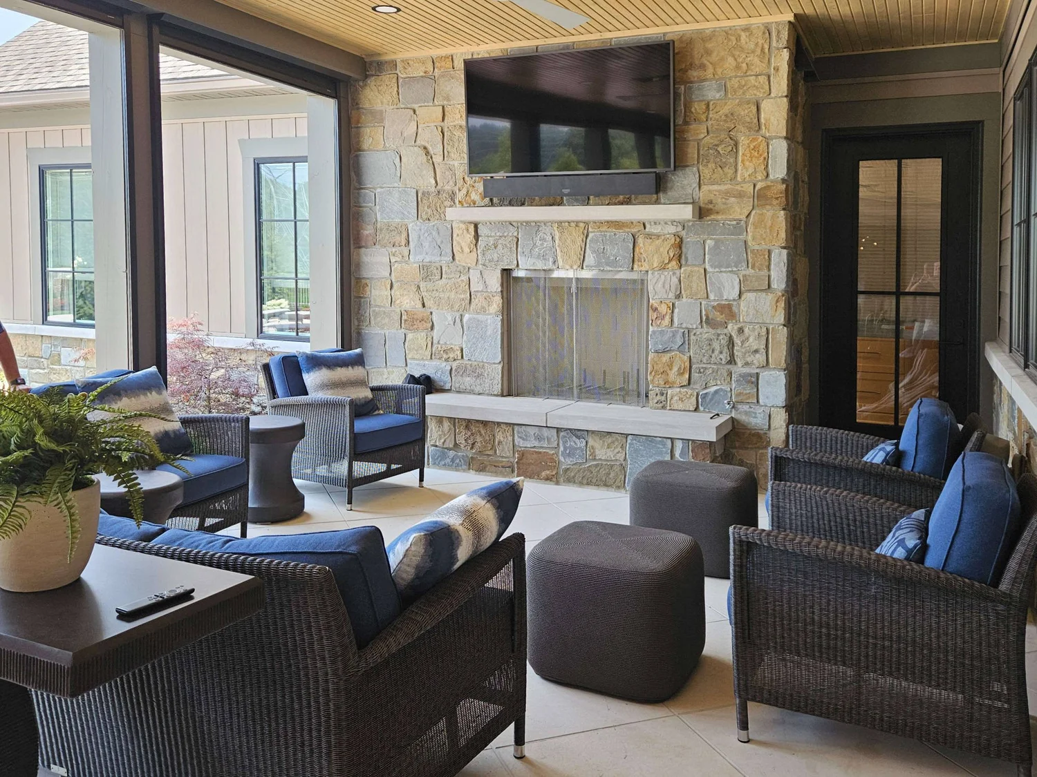 Covered patio with stone fireplace