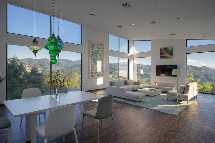 Great room with dining and a mountain view