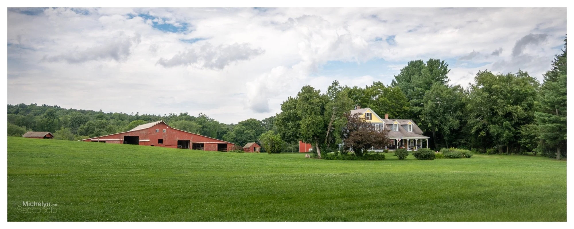 red-barn-yellow-farmhouse-panoramic.webp