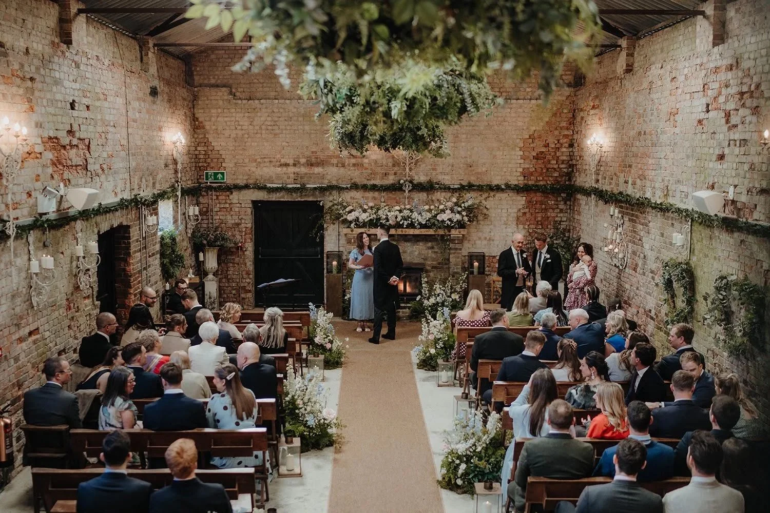 Wedding Celebrant in Surrey creates bespoke wedding ceremony at Botley Hill Barn a wedding venue in Surrey. Photo: Kit Meyers Photography