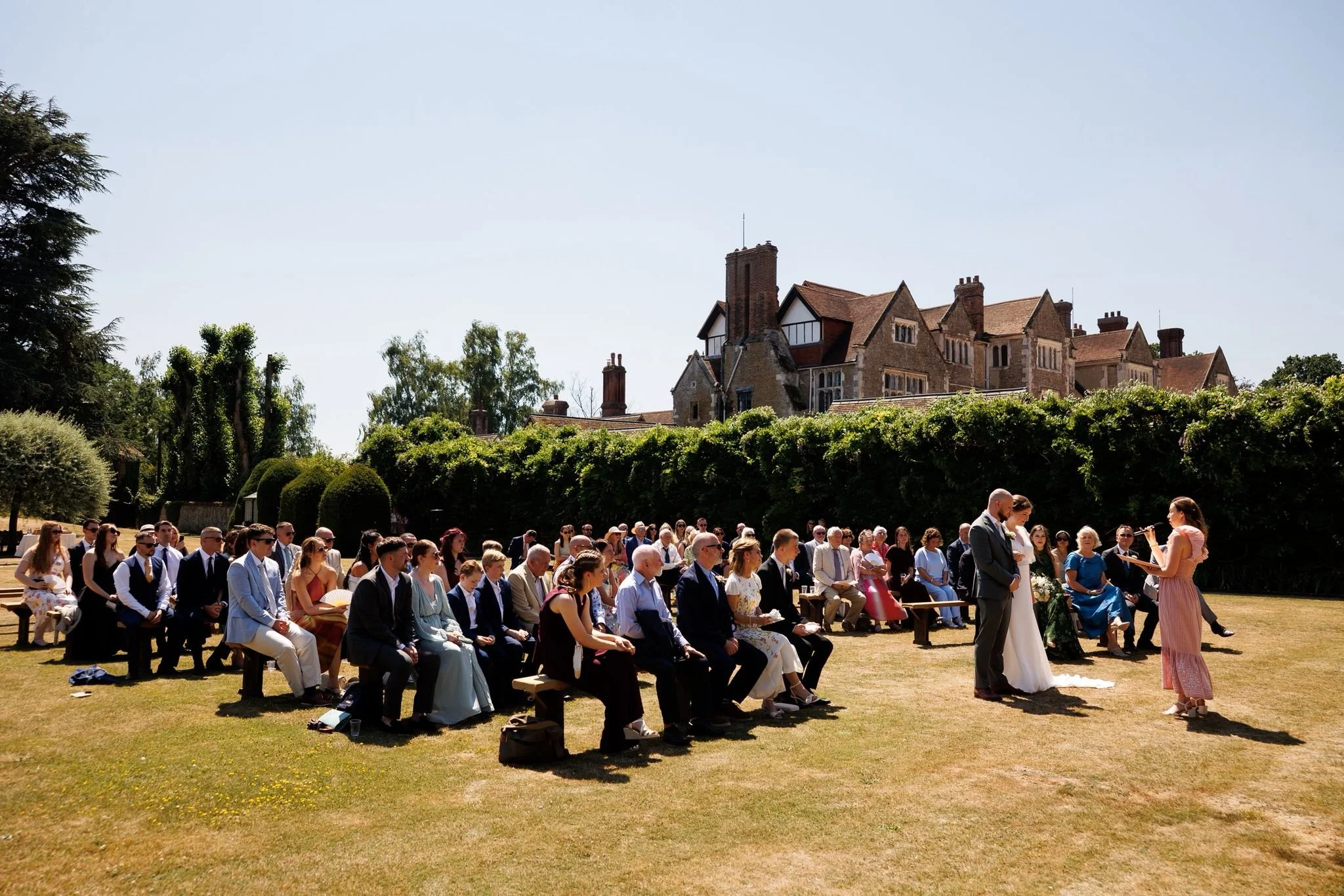 Couple during personalised wedding ceremony led by an Independent Wedding Celebrant in Surrey at Loseley Park. Guildford Wedding Venue, Photo: Laura Ellen 