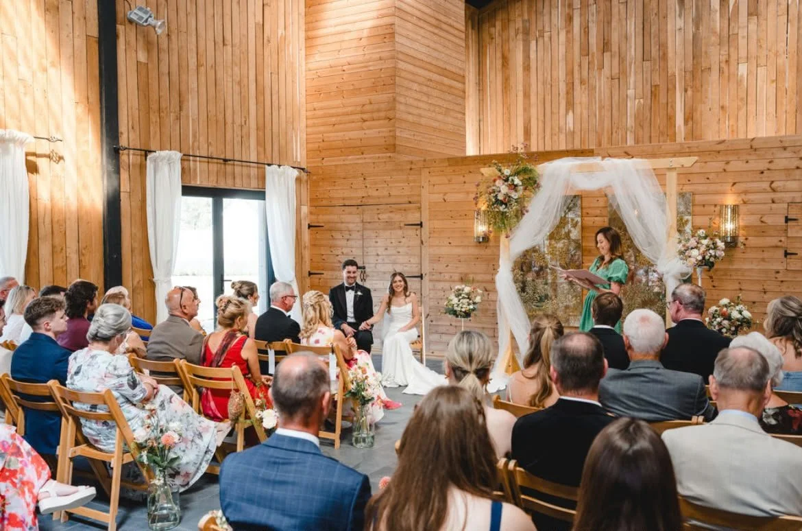 A couple enjoying their celebrant-led wedding ceremony by a wedding celebrant based in Surrey at Chafford Park, Kent. Photo: Parkershots
