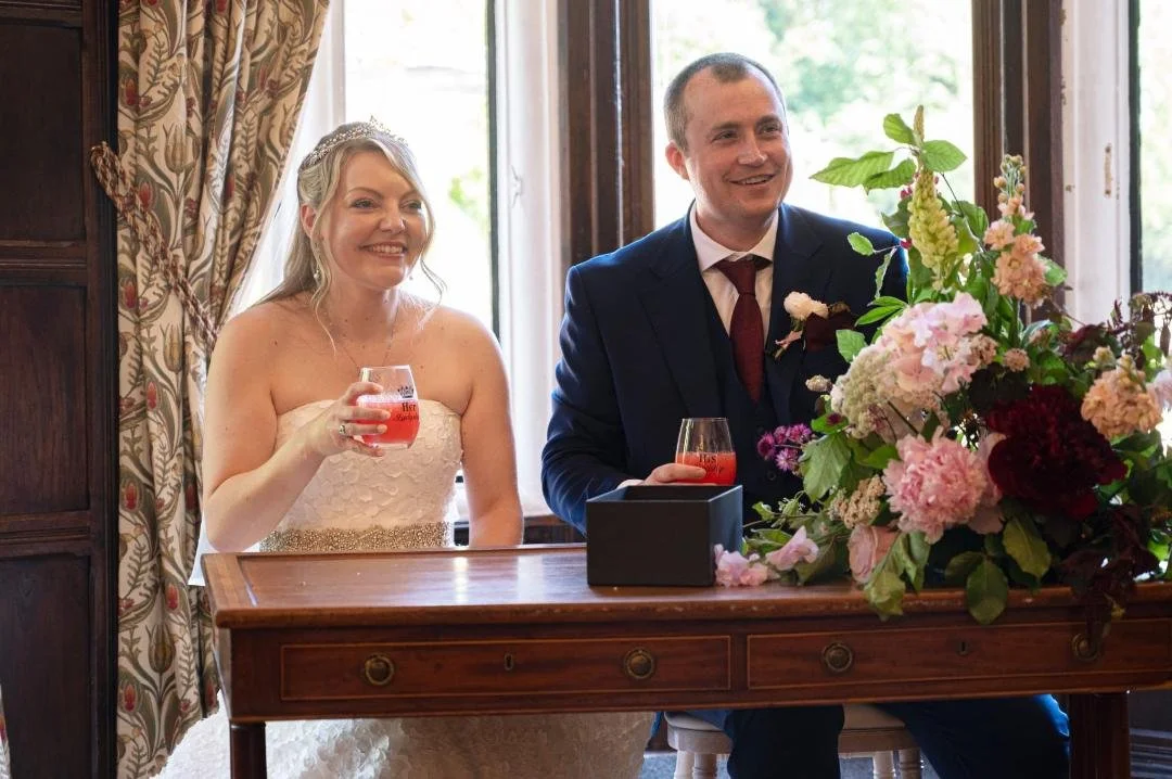 Independent Surrey wedding celebrant leading a relaxed and personalised wedding ceremony at Marden Park Mansion in Surrey. Photo: Emma Hall Photography