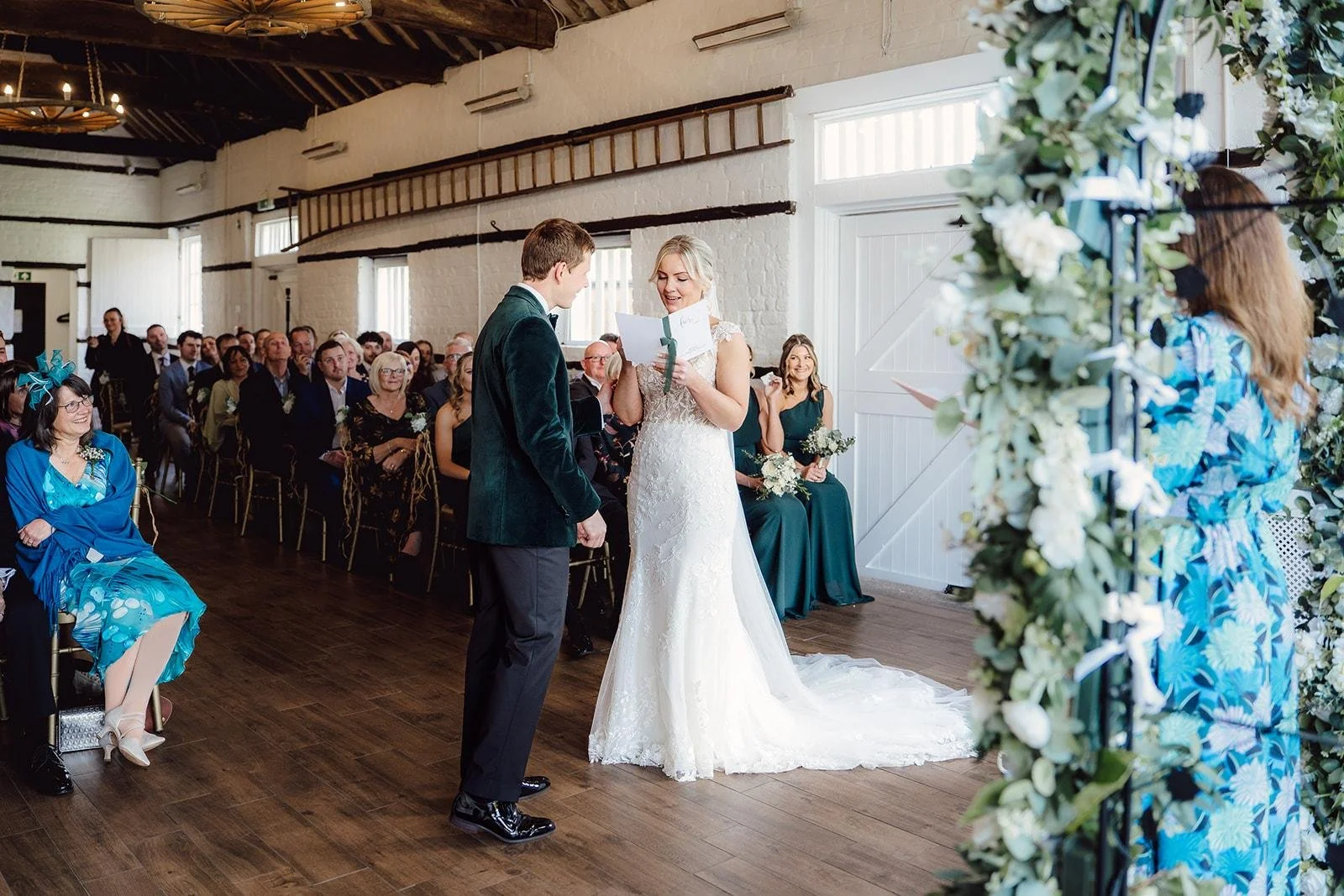 A couple celebrate their wedding ceremony at Lillibrooke Manor in Berkshire, led by an independent Surrey wedding celebrant, creating a relaxed and personalised celebration with family and friends. Photo: Amy Diana Photography