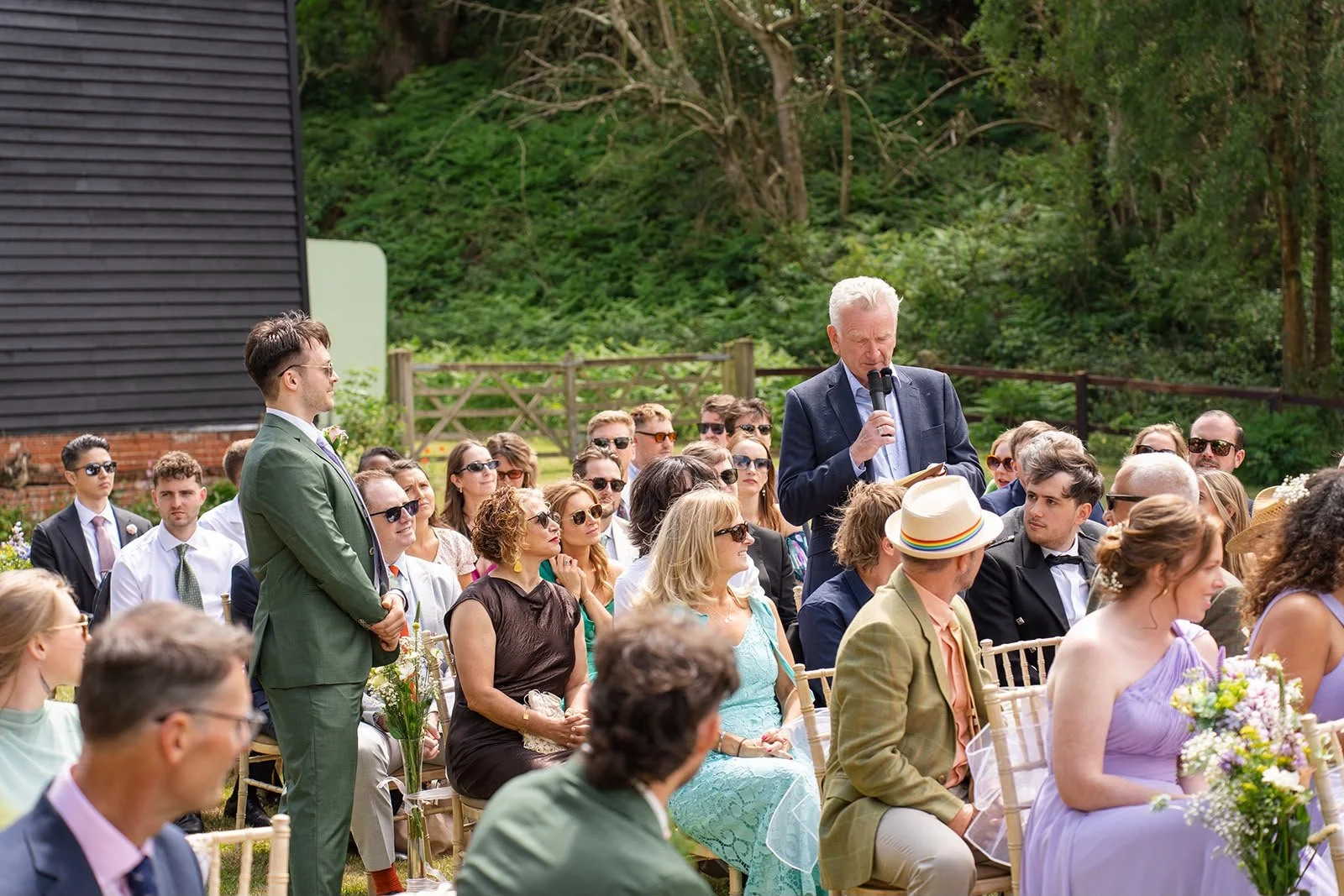 Surprise reader during unique wedding ceremony at Sprotts Farm, Colchester, crafted by a wedding celebrant in Surrey. Photo: Soulful Reflection