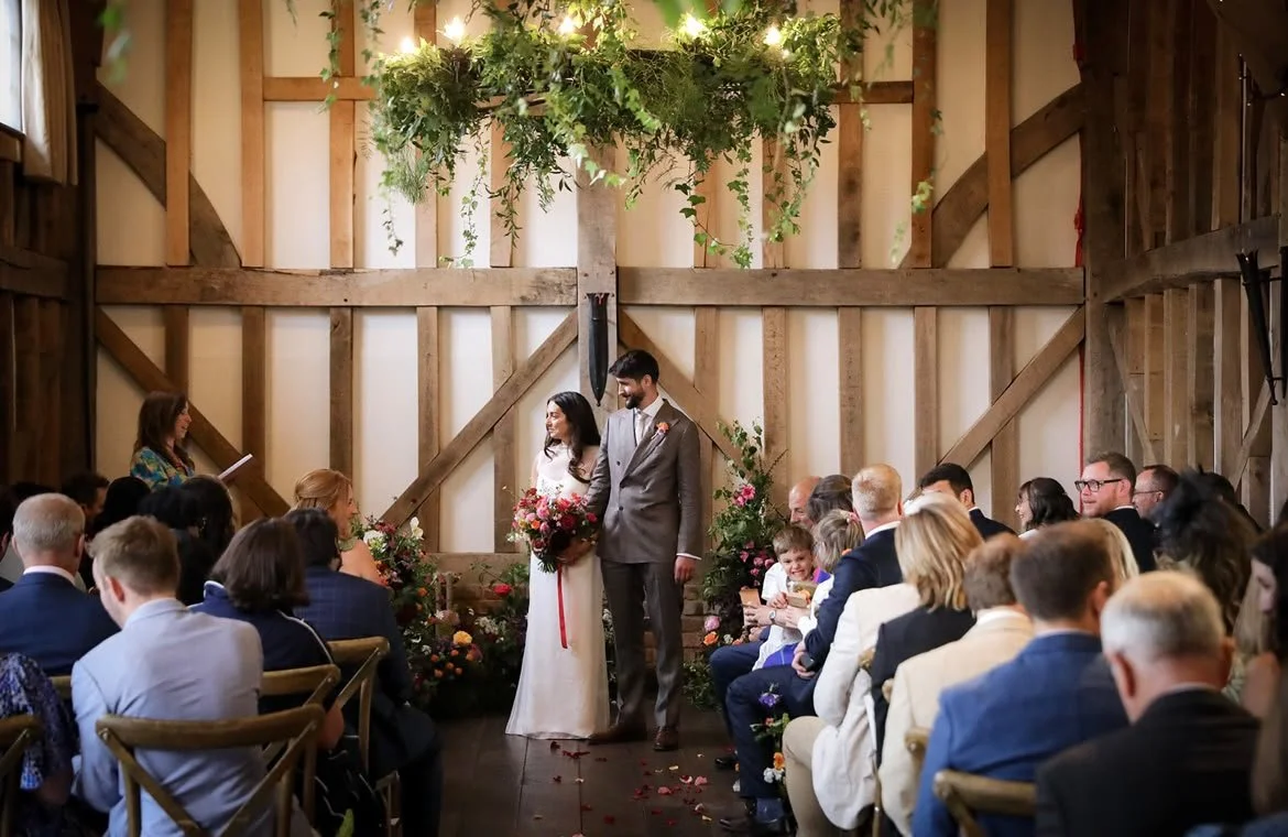 Couple enjoying their personal wedding ceremony at Surrey Wedding Venue, Gate Street by  a wedding celebrant in Surrey. Photo: VLA Wedding Photography