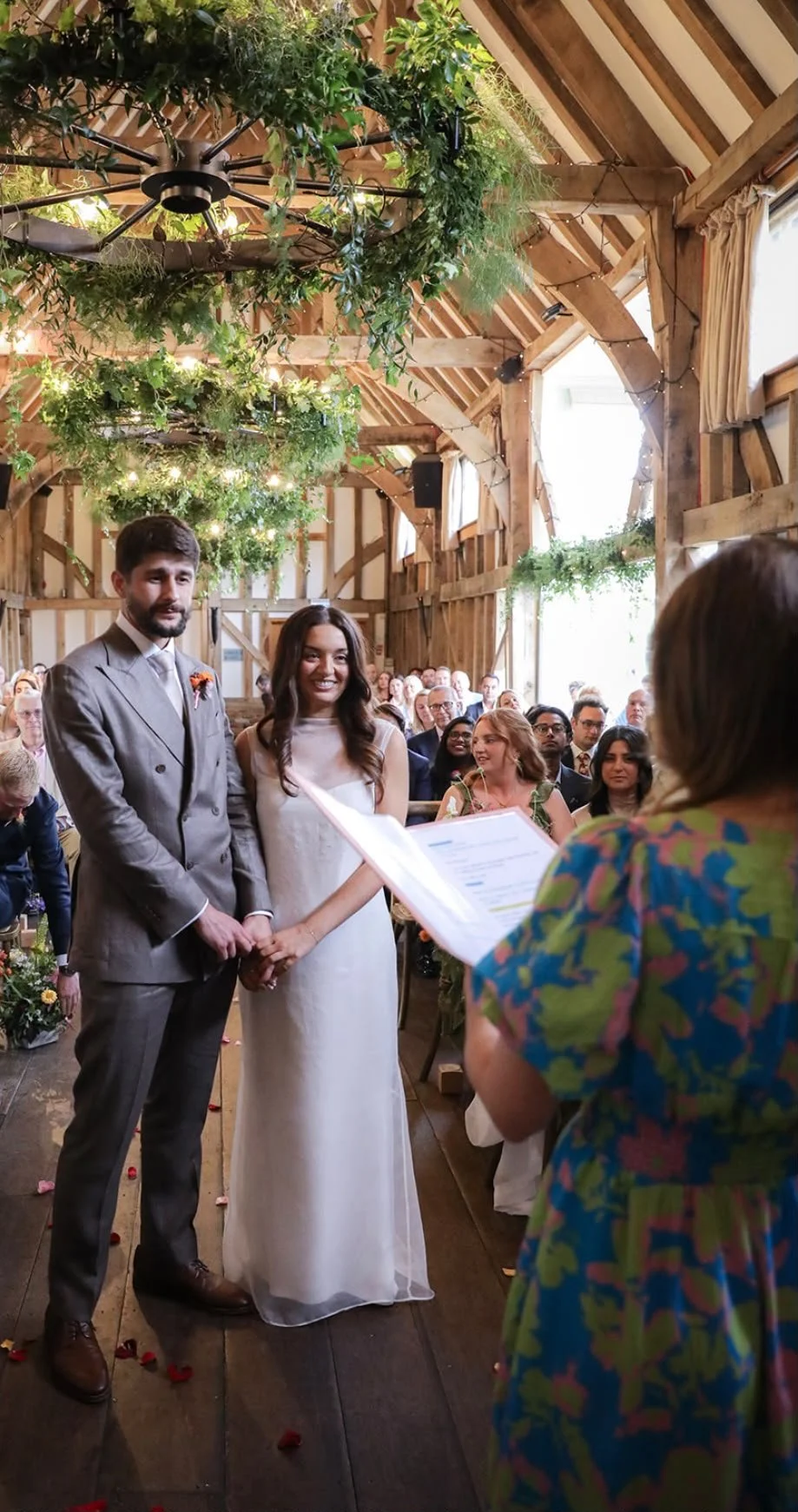 Couple during celebrant-led wedding at Surrey wedding venue, Gate Street Barn. Photo: VLA Photography