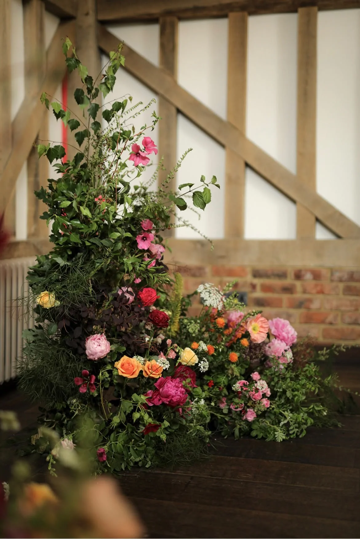 Unstructured natural flower arrangement by Caroline at Hayloft Floral 
Photo: VLA Wedding Photography
