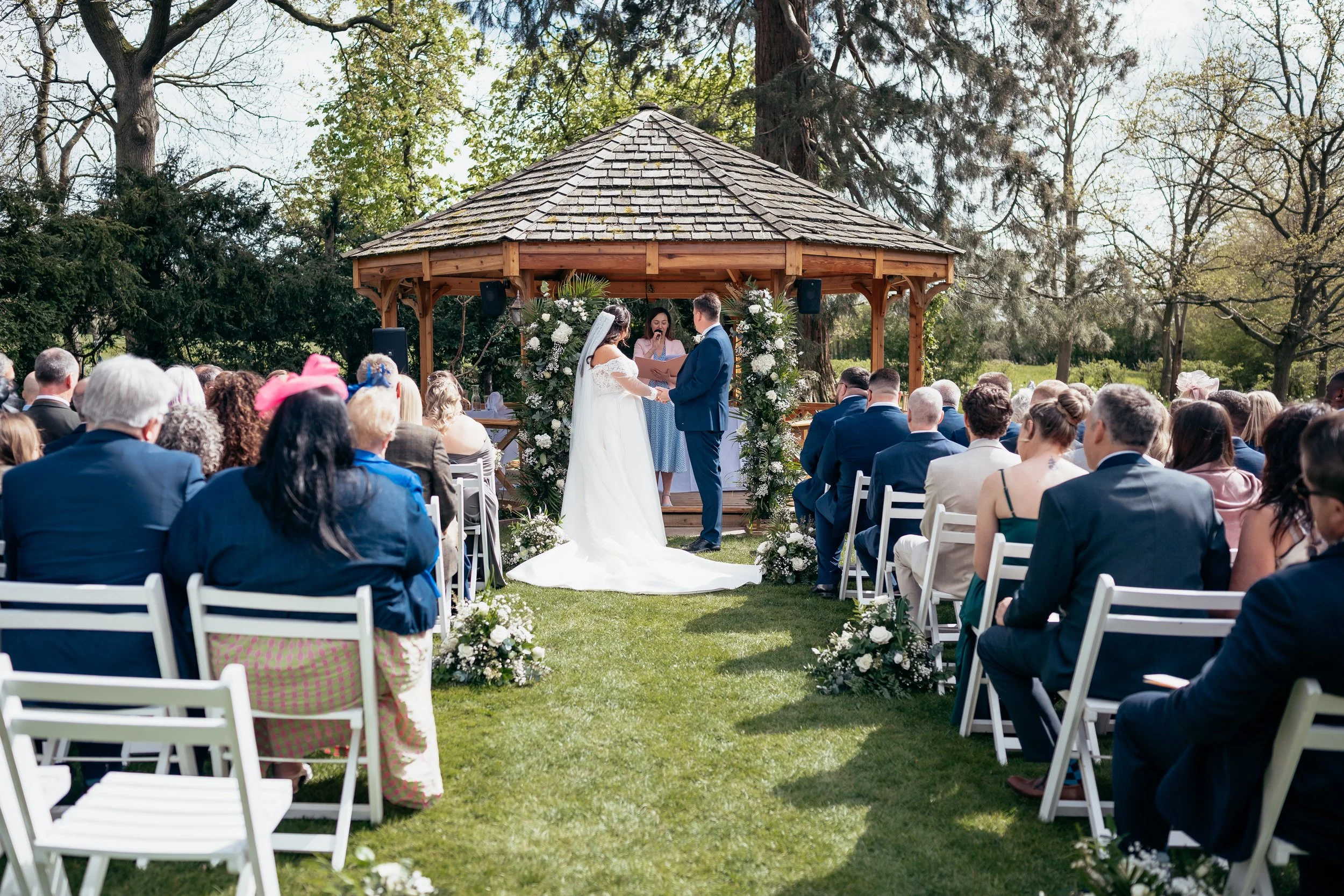 Wedding Celebrant in Surrey creates and delivers romantic wedding ceremony at Mulberry House, Essex wedding venue. Photo: Eyebrow Photography