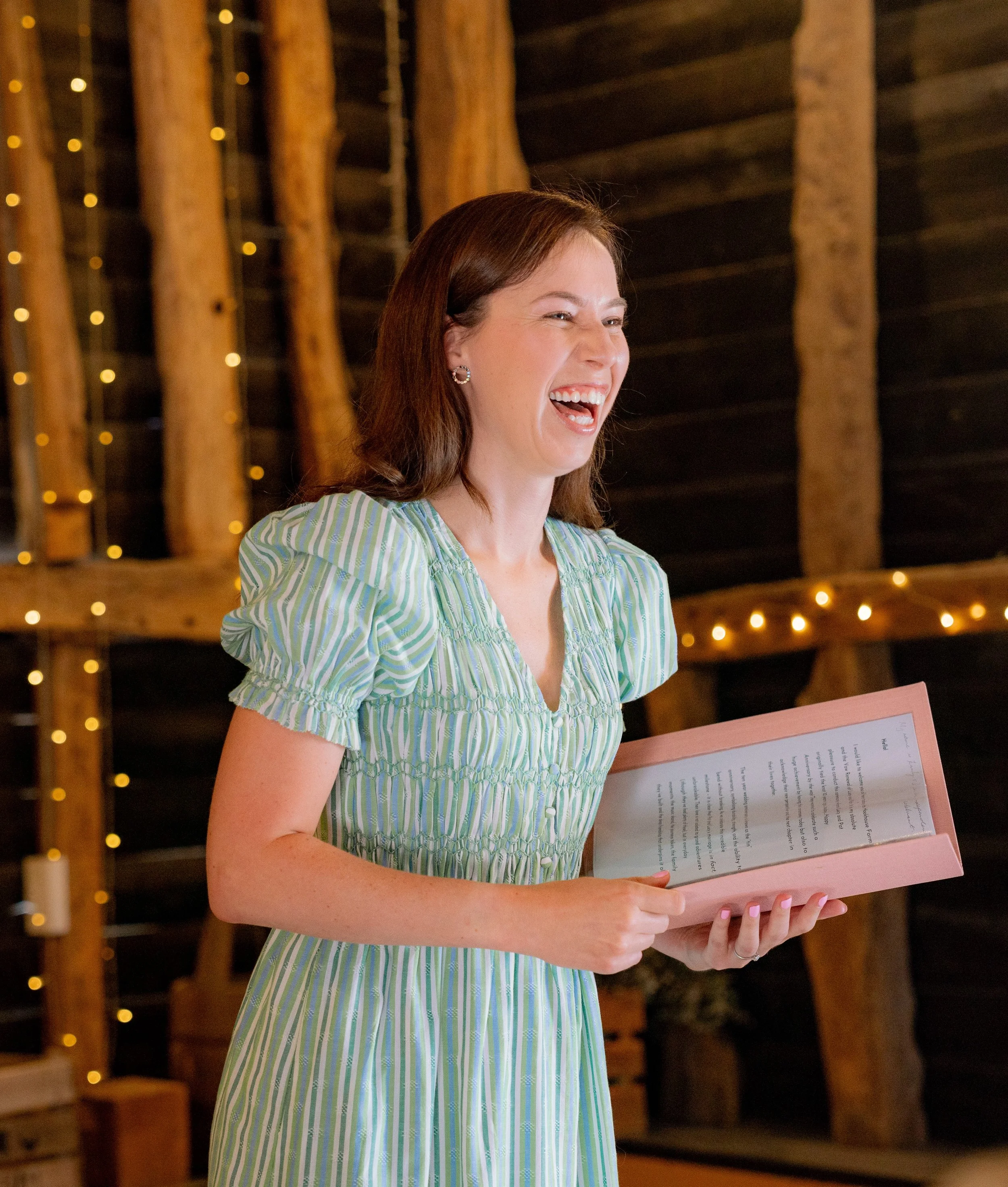 Surrey Wedding Celebrant delivering a ceremony at Surrey Wedding Venue Hookhouse Farm, Surrey. Photograph by Cat Brant, Surrey photographer