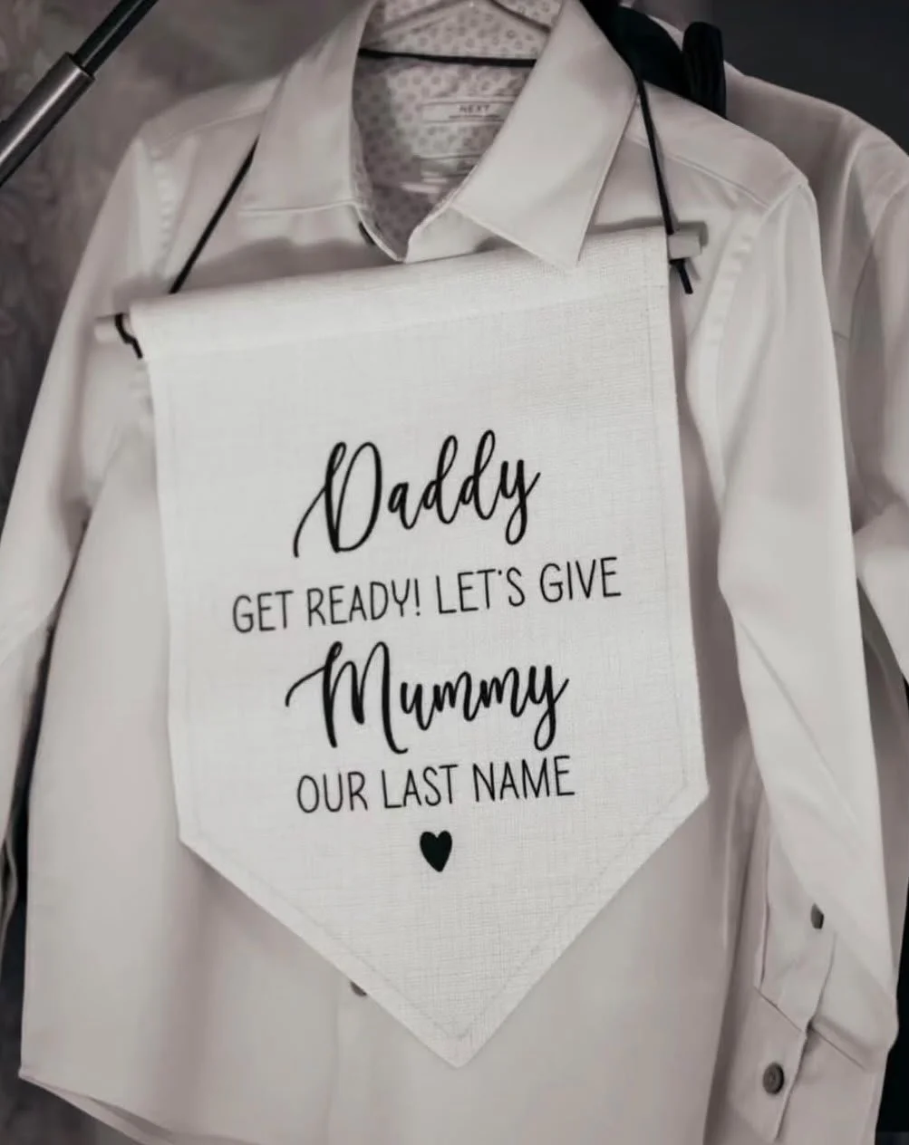 Sign for child to wear walking down the aisle at Mulberry House, wedding venue in Essex, ahead of a celebrant-led wedding ceremony led by a Surrey-based wedding celebrant 
Photo: Eyebrow Photography
