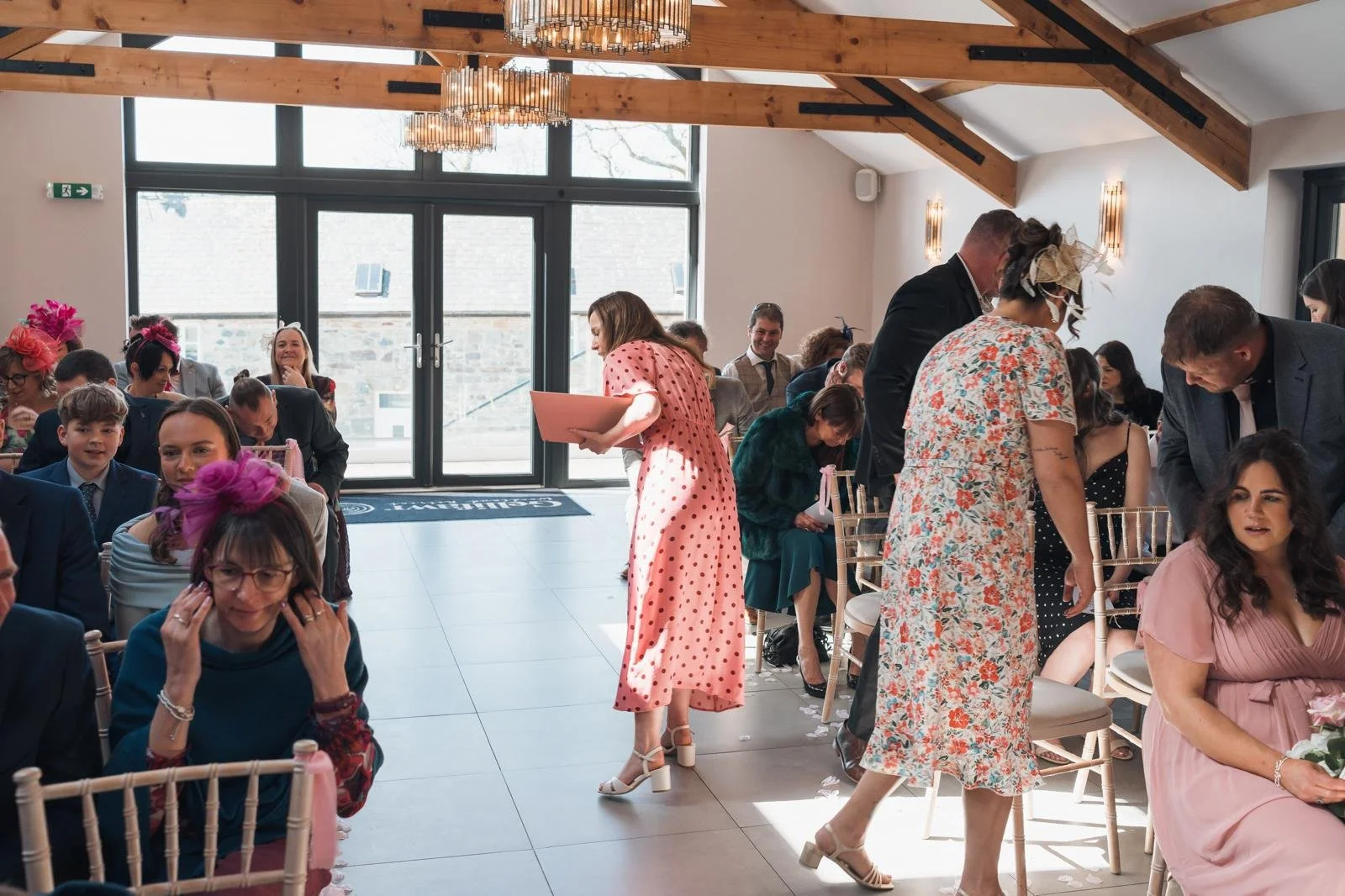 Surrey based wedding celebrant and guests hunt for rings during celebrant led wedding  ceremony at Gellifawr, Woodland Retreat, Wales
Photo: Brown & Dixon Photography