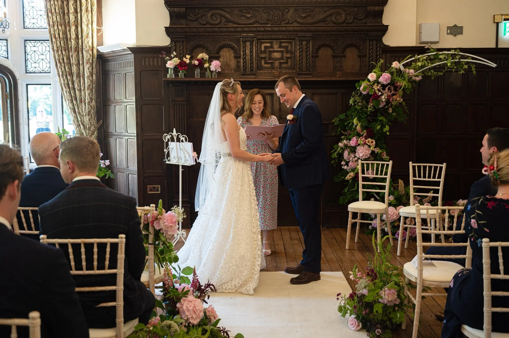 Independent Surrey wedding celebrant leading a relaxed and personalised wedding ceremony at Marden Park Mansion in Surrey. Photo: Emma Hall Photography
