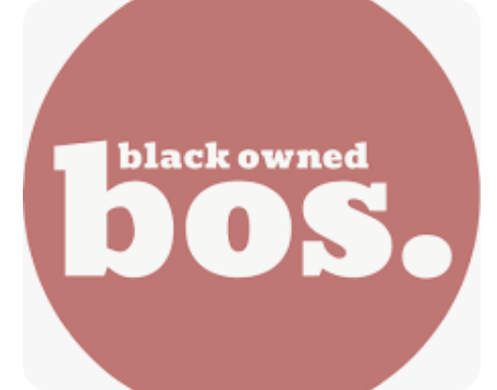 A pink circle with white text that says