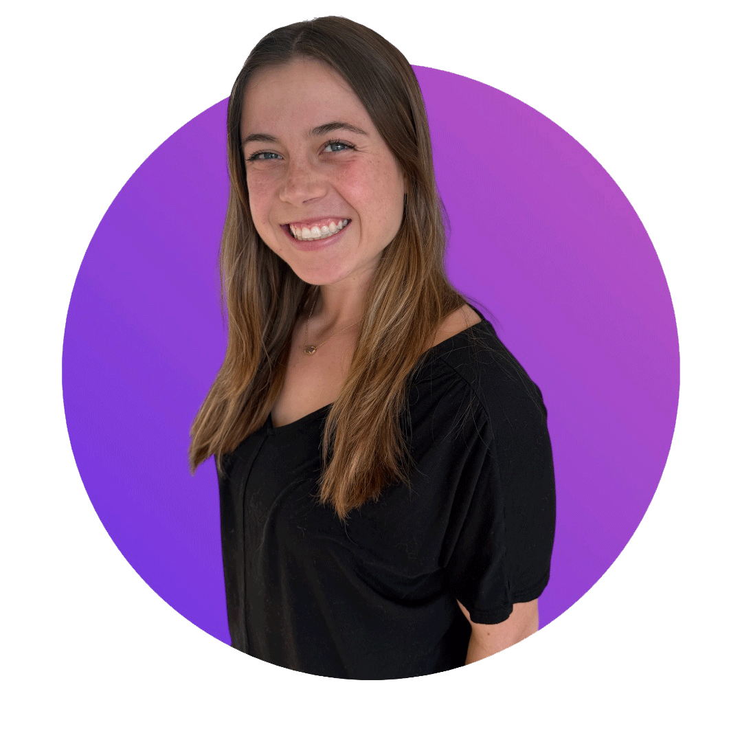 A young woman with long, light brown hair, smiling, standing in front of a circular purple background, wearing a black top.