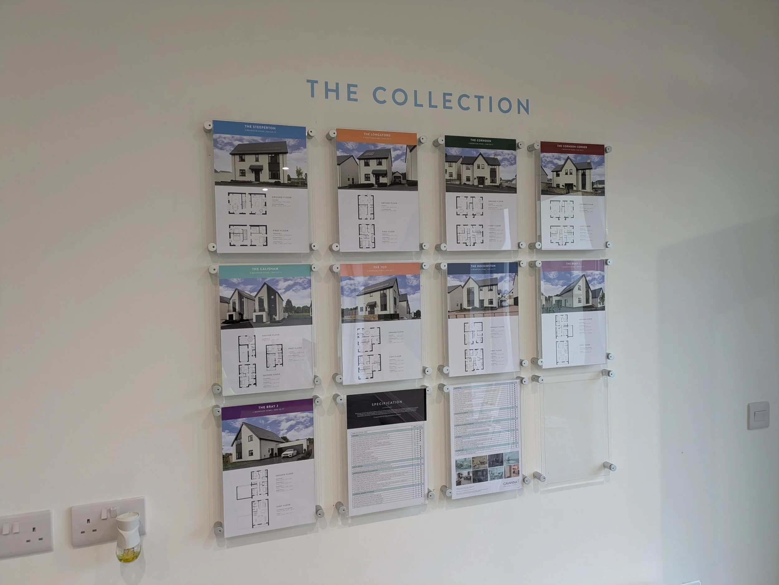 A4 winged pocket displays secured with stand-off fixings