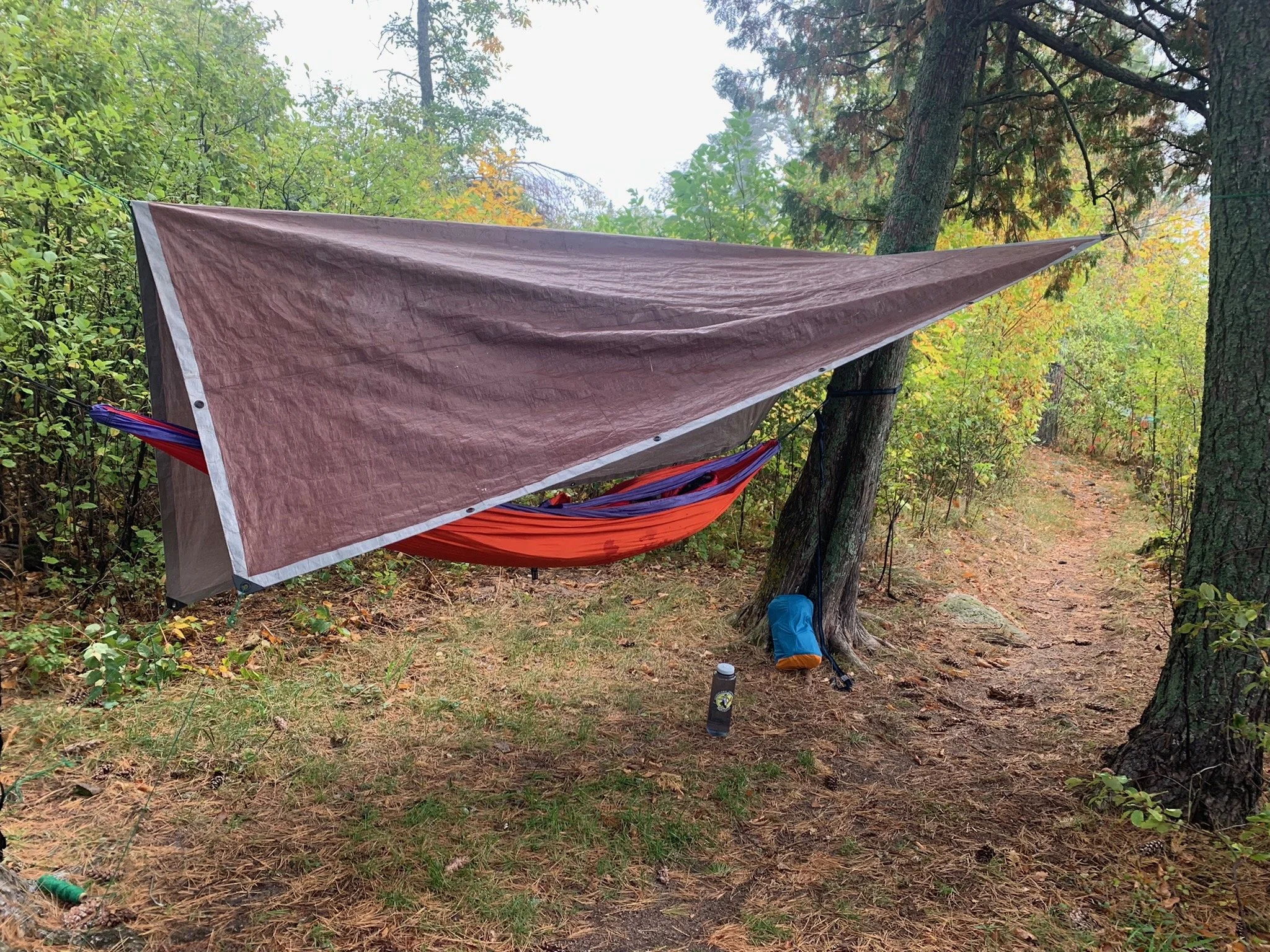 Tarp and hammock setup for a canoe camping excursion in the Boundary Waters Wilderness Area
