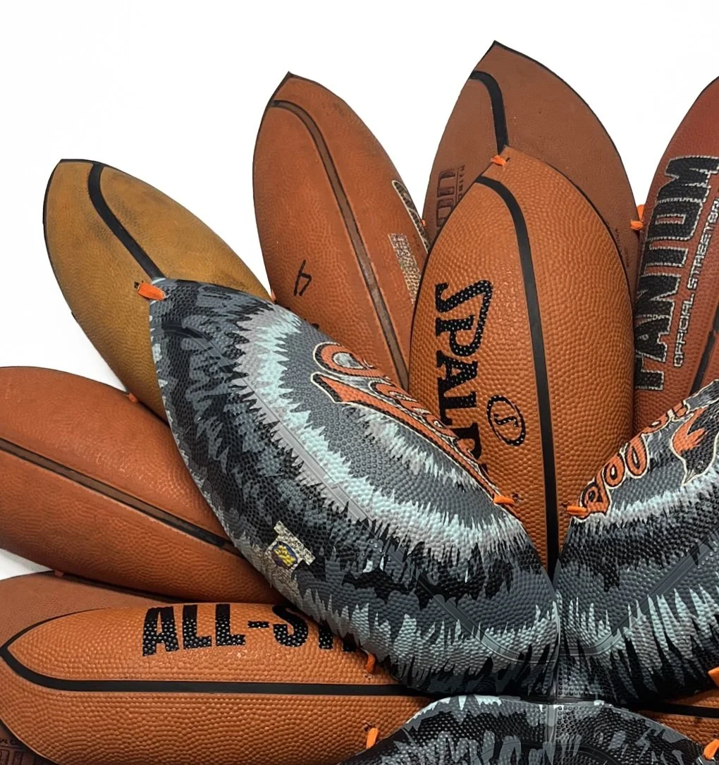 BRANDON J. DONAHUE-SHIPP-Basketball Bloom (0rioles)_Searched for and found basketballs, shoestrings_31x31x5 inches_ 2026.jpg