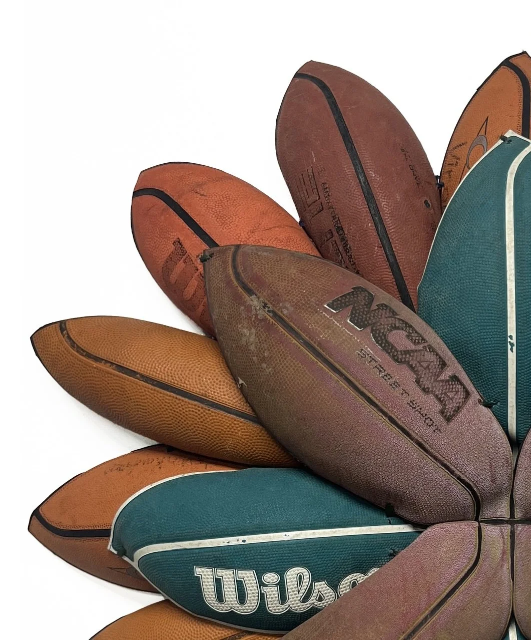 BRANDON J. DONAHUE-SHIPP- Basketball Bloom (Fade)_Searched for and found basketballs, shoestrings_31x31x5 inches_2026 copy.jpg