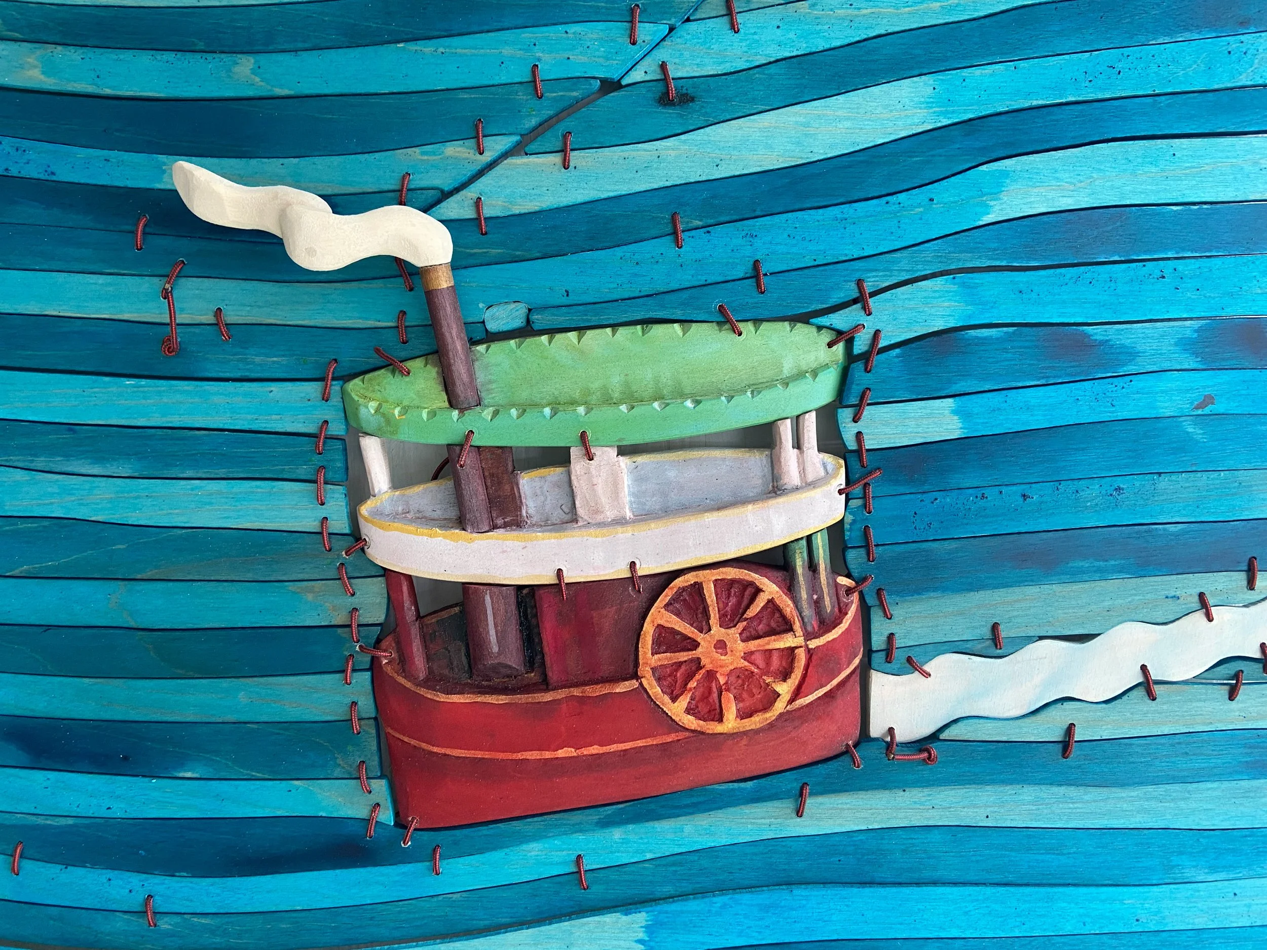 Dan Gunn- PADDLEBOAT SCENERY | 34 x 46 x 2 inches / 86 x 116 x 5 cm, acrylic, light stable metalized acid dye and polyurethane on birch plywood and poplar with nylon cord, 2026