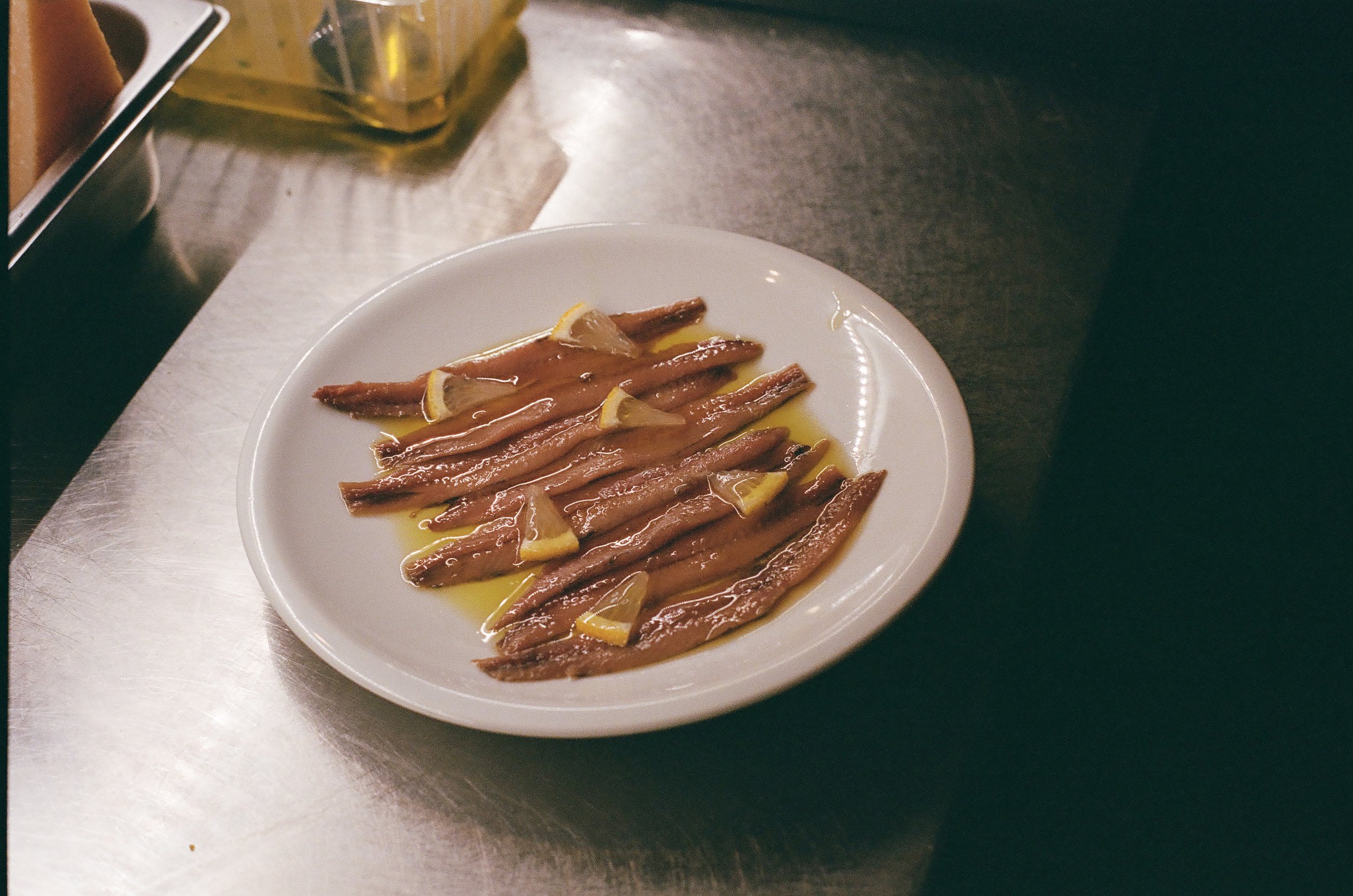family meal at Enoteca l'Antidoto in Rome | photo: Olivia Cappelletti