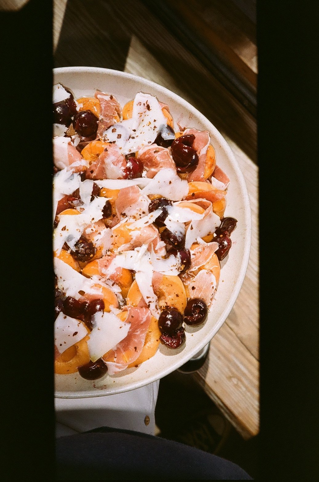 sugarcube melon, pickled cherries, garrotxa, prosciutto di parma | photo: Olivia Cappelletti