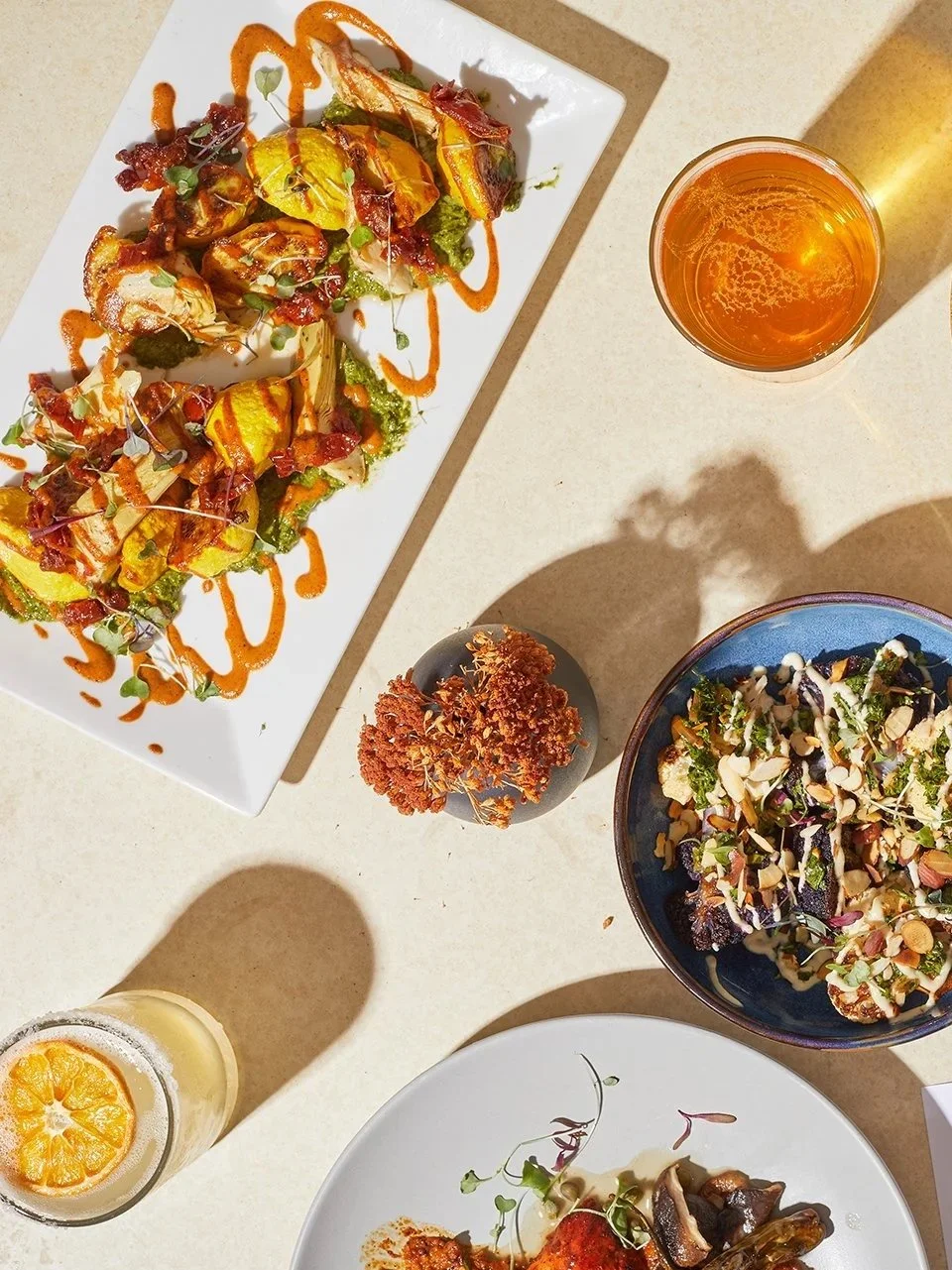 Norman lunch menu featuring drinks, salads, starters, and sandwiches in Los Alamos.
