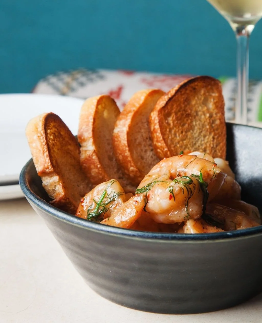 The secret behind Norman&rsquo;s Spanish Garlic Shrimp? Chef Tyler&rsquo;s @windrosefarm garlic confit 🧄⁠
⁠
&ldquo;Whenever I get the chance to use Windrose garlic, I try to make the most of it in multiple ways. My favorite is to confit the whole ga