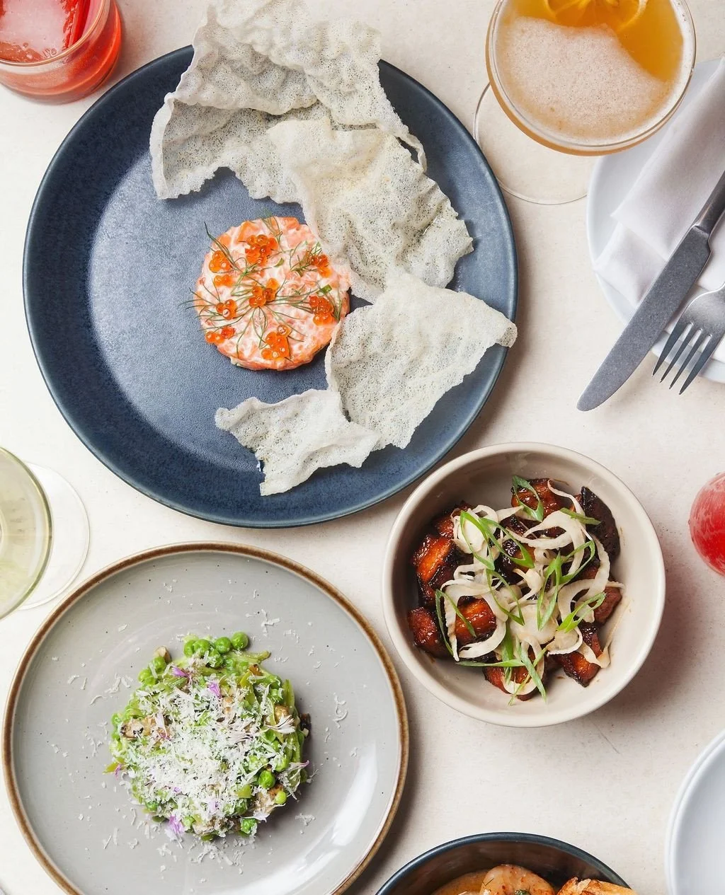 Ordering for the table? Start here:⁠
⁠
&raquo; Salmon Tartare with rice paper crisps⁠
&raquo; Sweet &amp; Spicy Pork Belly Bites⁠
&raquo; Asparagus &amp; Snap Peas⁠
⁠
Nightly at Norman. ⁠
⁠
.⁠
.⁠
.⁠
⁠
Photos: @jenjoi