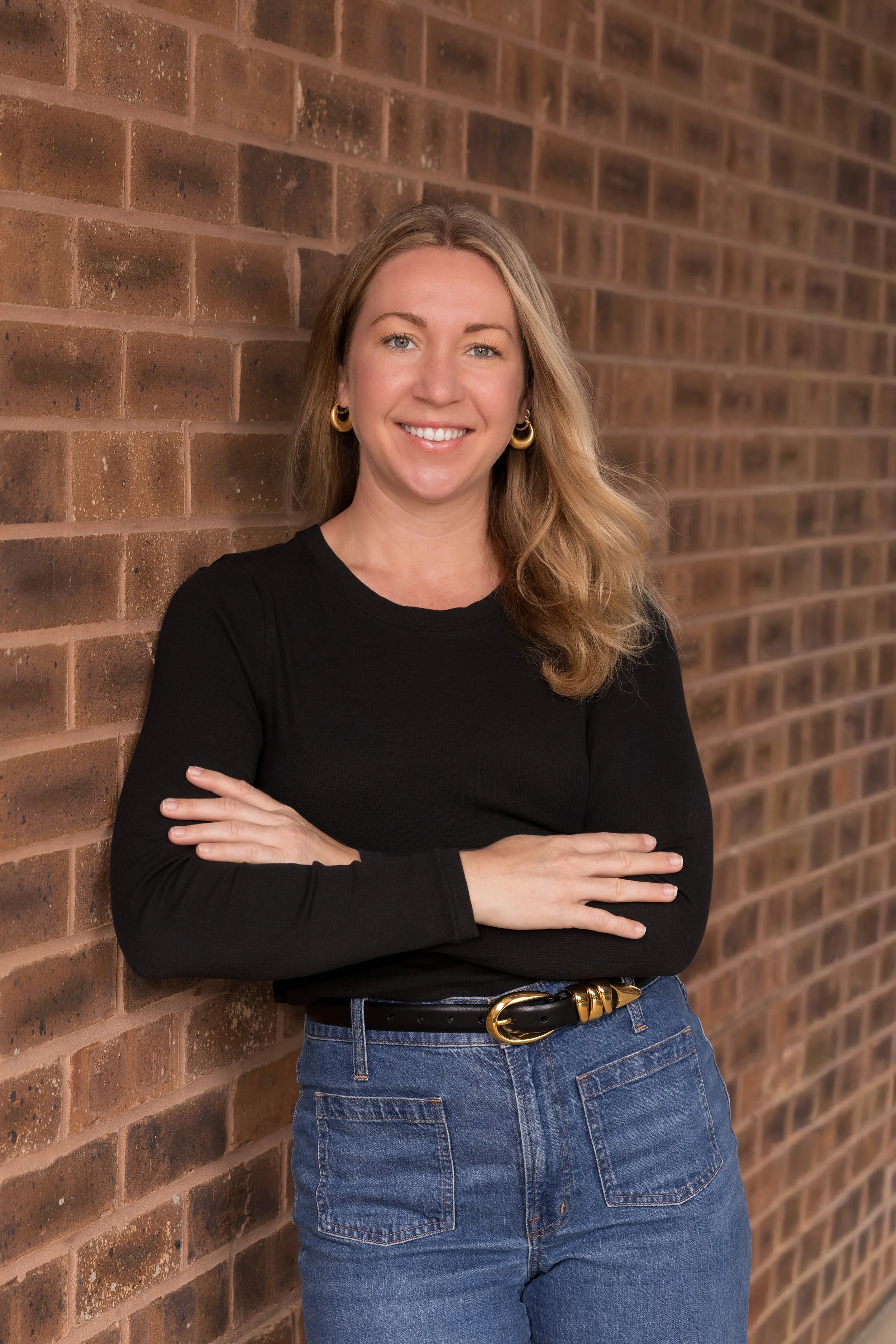 picture of bookkeeper in atlanta, ga outside against brick building
