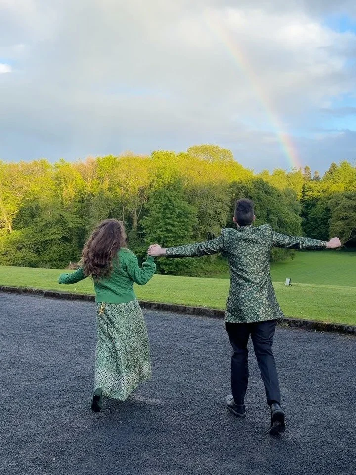 Day one of Rosa &amp; Ryan&rsquo;s wedding at Belleek Castle involved a radiant queen in scarlet, a dungeon tour, a katar duel, delicious Indian food, a rainbow, blissful exuberant joy, frothy pints of Guinness, raining flower petals, and overflowing