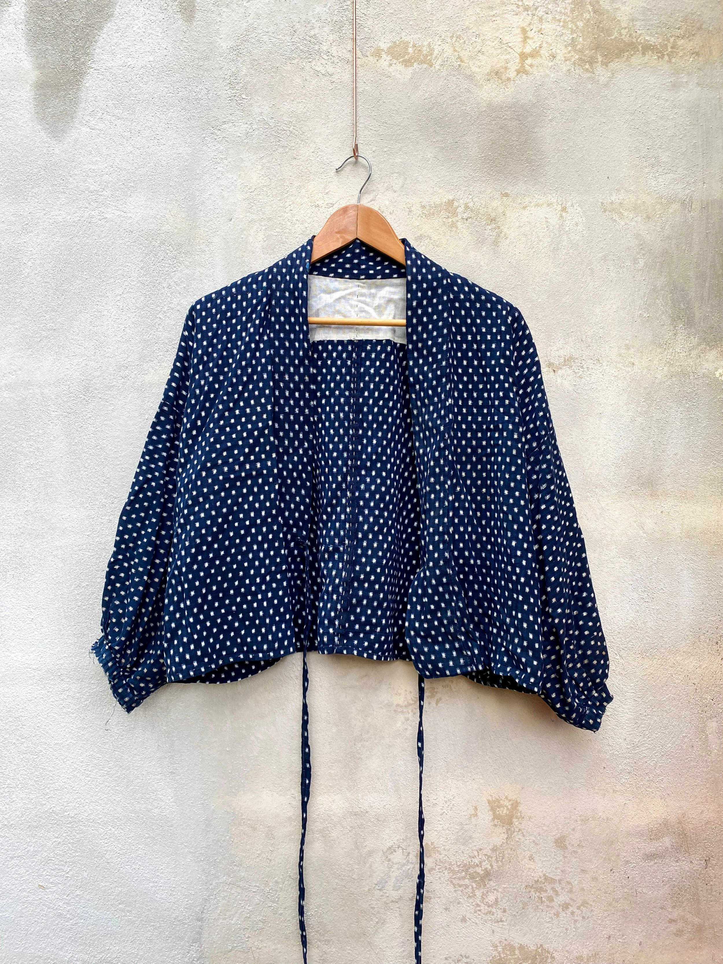 Abrigo liviano (costura a mano) .jpg