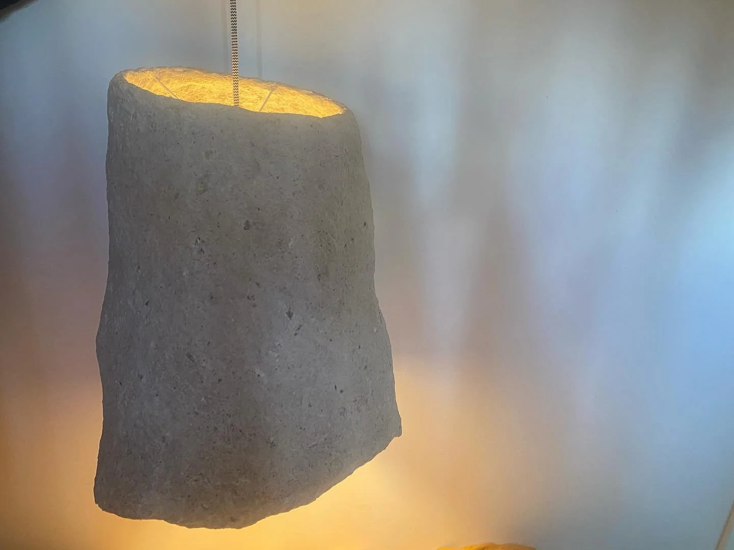 (((21&rdquo; tall x 17&rdquo; round)))(((pendant)))This very first shade was an experimental project made to hang in my own home. It looks like high desert adobe, but was constructed entirely from neighbor Mary&rsquo;s newspapers and empty egg carton